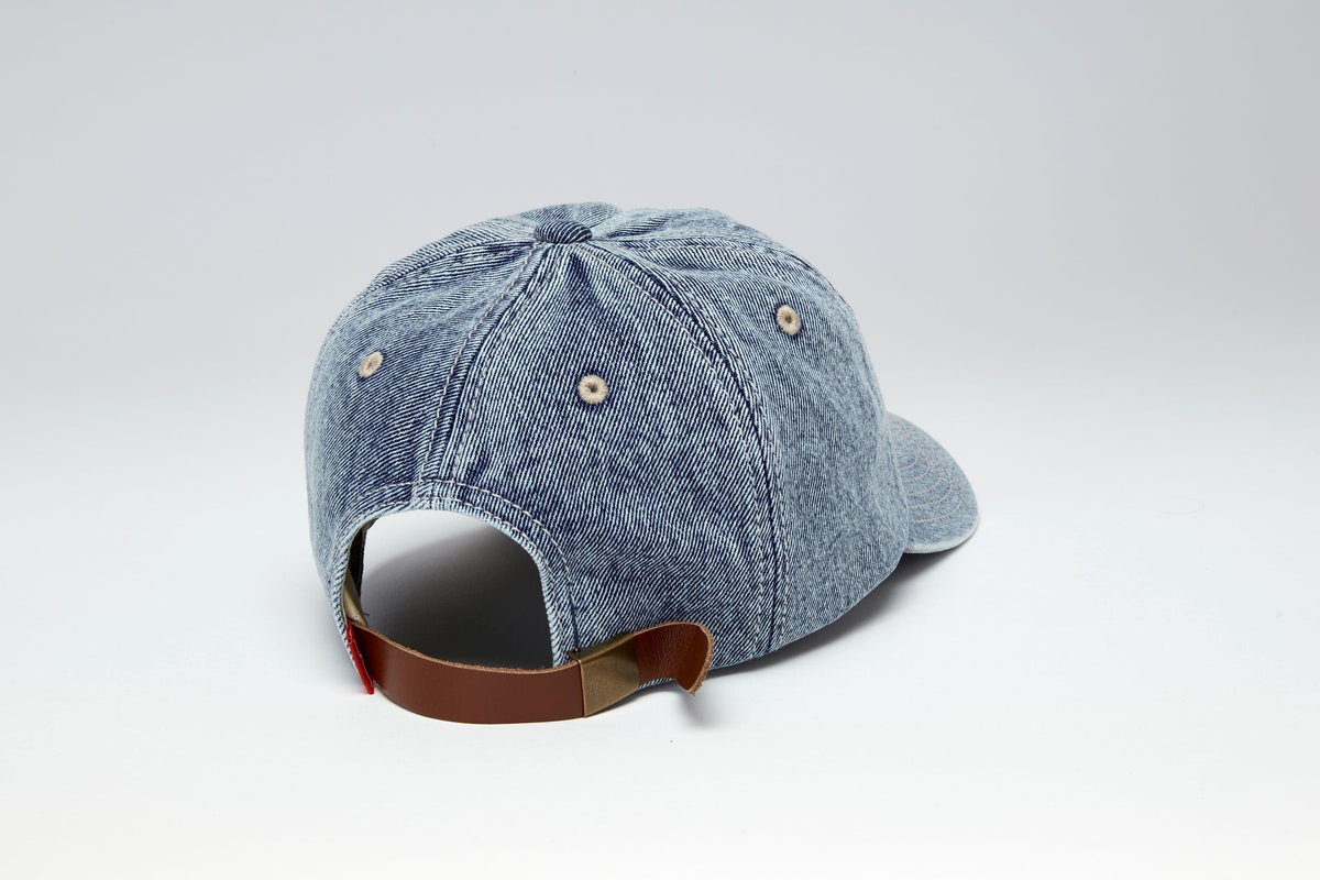 Kimes Ranch Durango hat in Indigo, back view, with a brown back strap