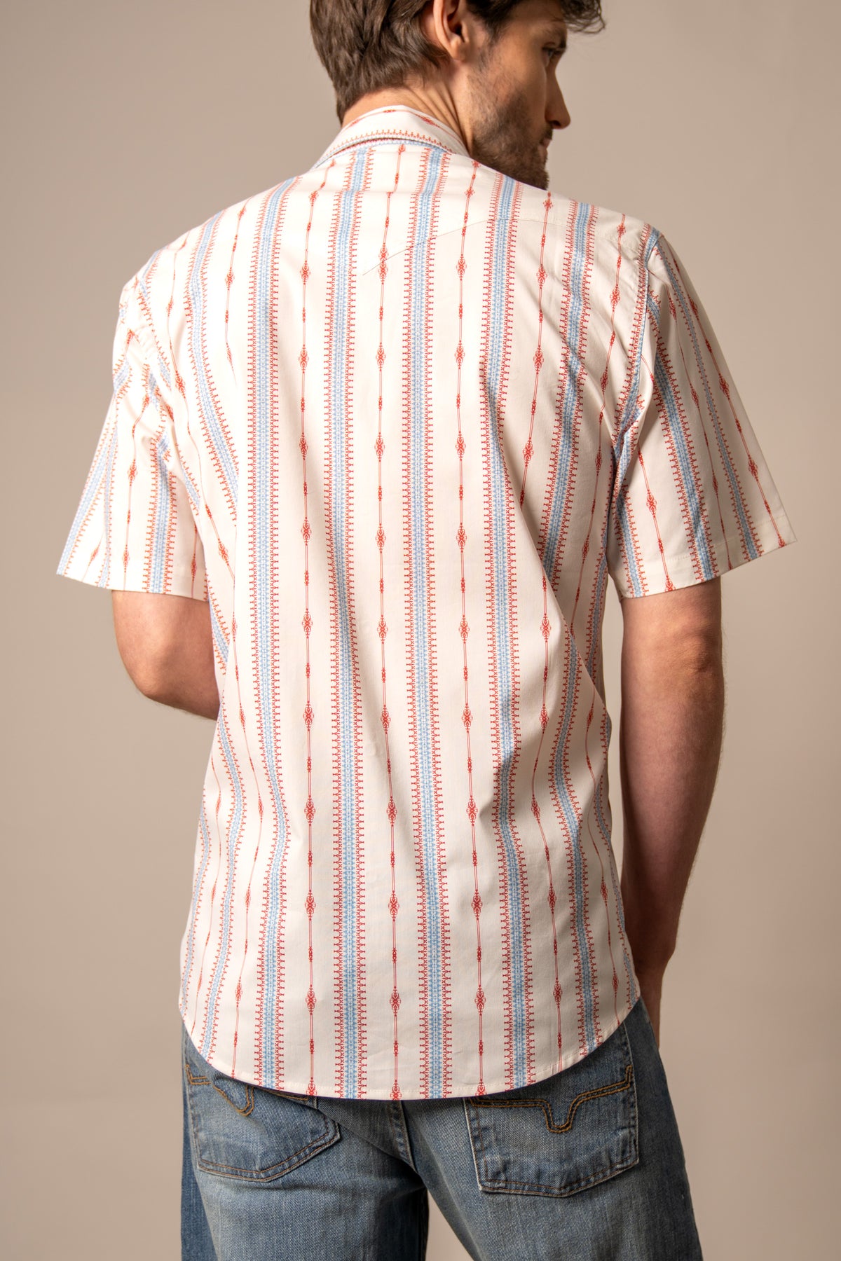 Kimes Ranch Sonny dress shirt in Brick Red, back view, with vertical red and blue patterned stripes