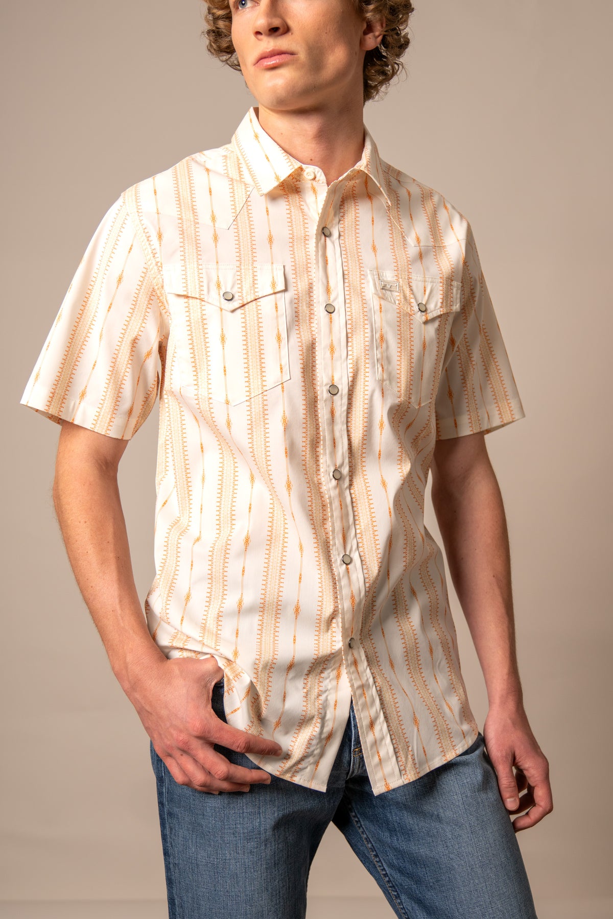 Kimes Ranch Sonny short sleeve dress shirt in Orange with vertical pattern and two chest pockets