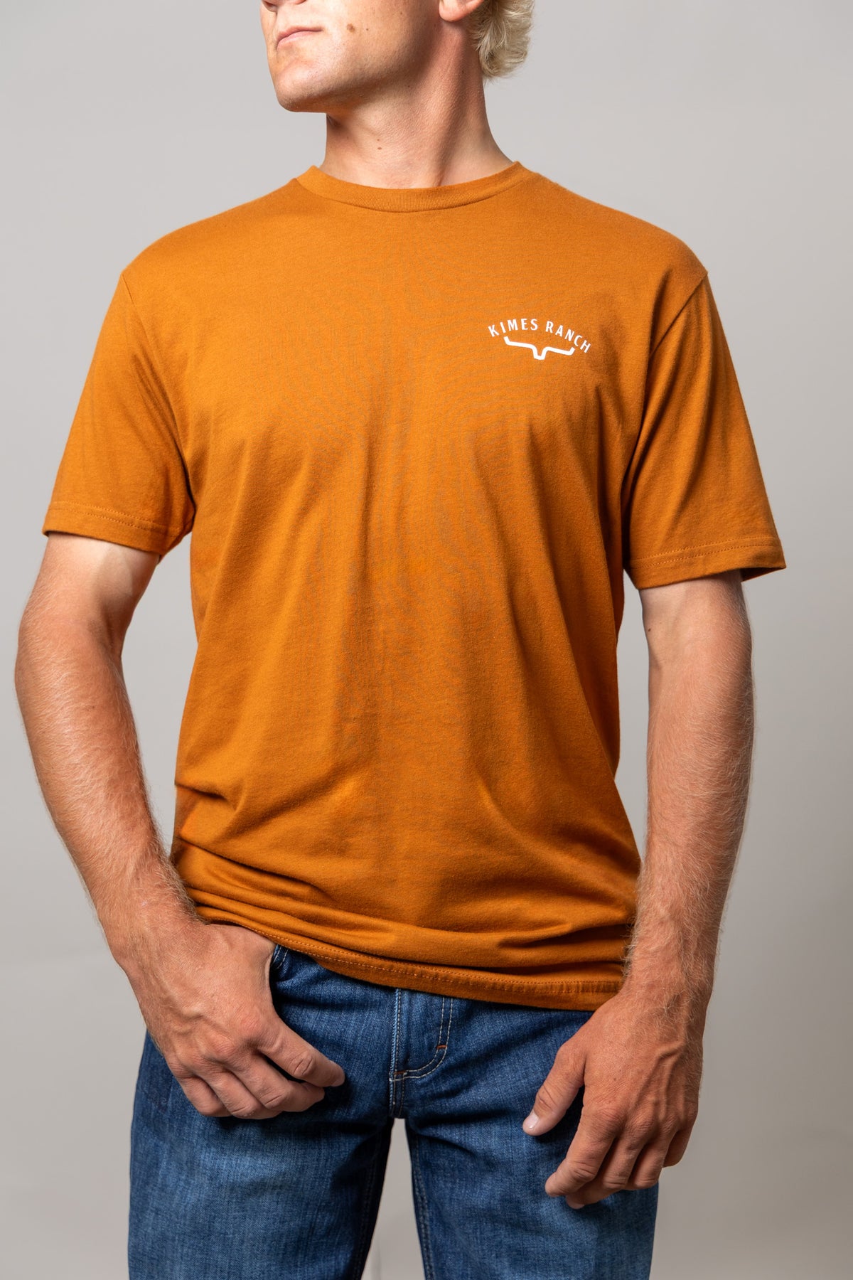 Kimes Ranch Southwestern shirt in Clay with short sleeves and a Kimes Ranch logo on the chest