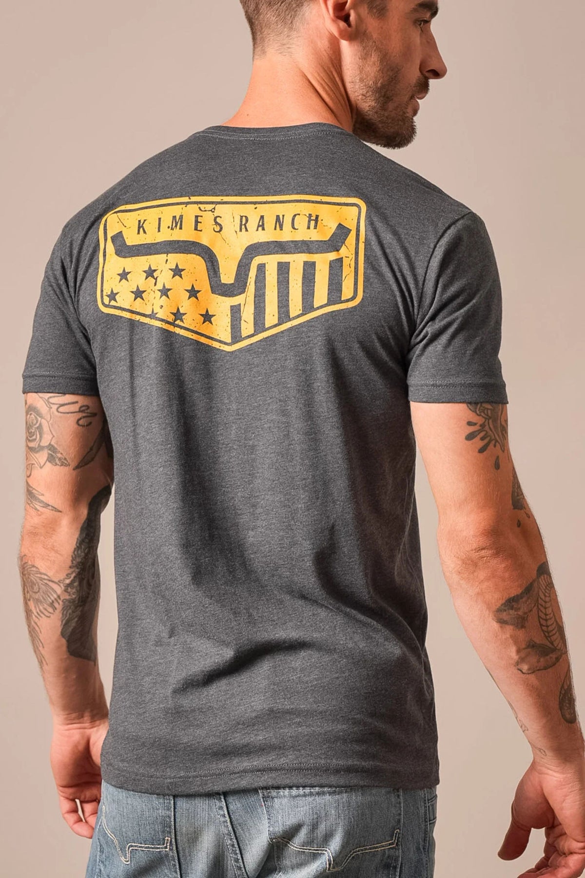 Kimes Ranch Spangled shirt in Charcoal, back view, with a back graphic featuring the Kimes Ranch logo and stars
