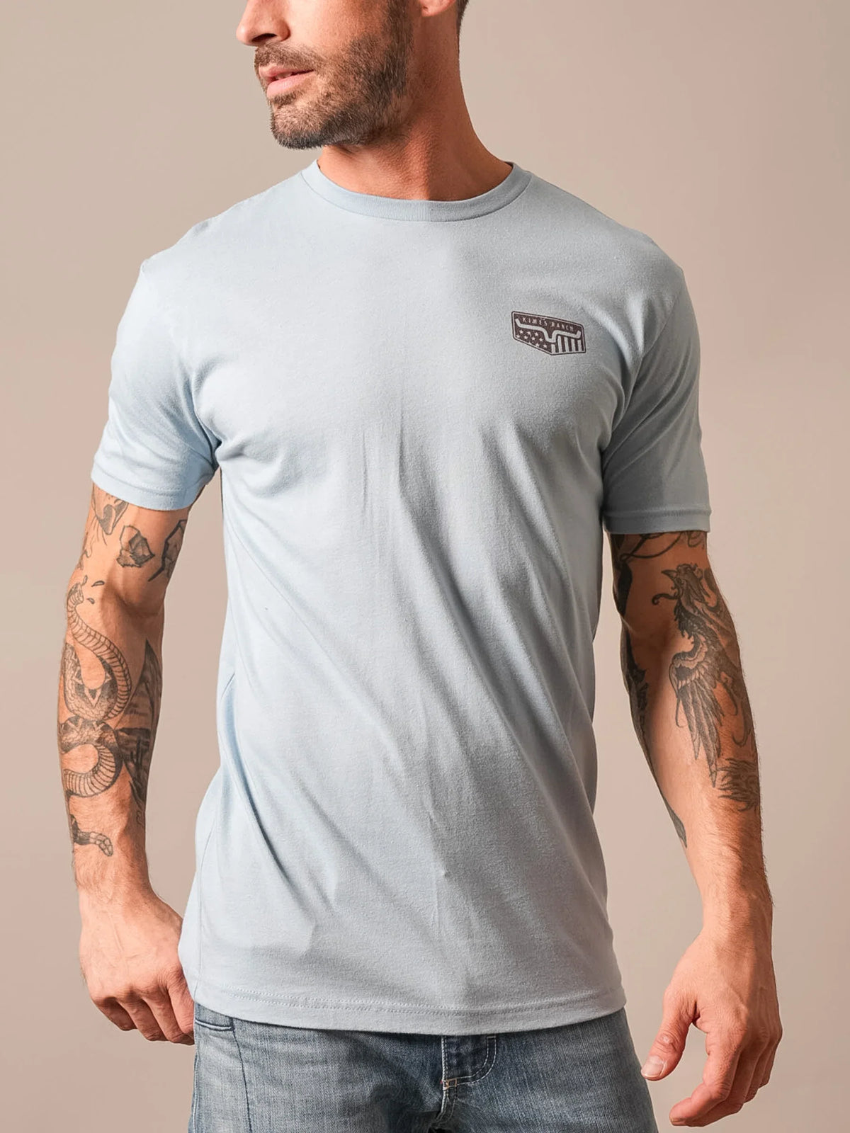 Kimes Ranch Spangled shirt in Stonewash with short sleeves and a crew neck featuring the Kimes Ranch logo on the chest
