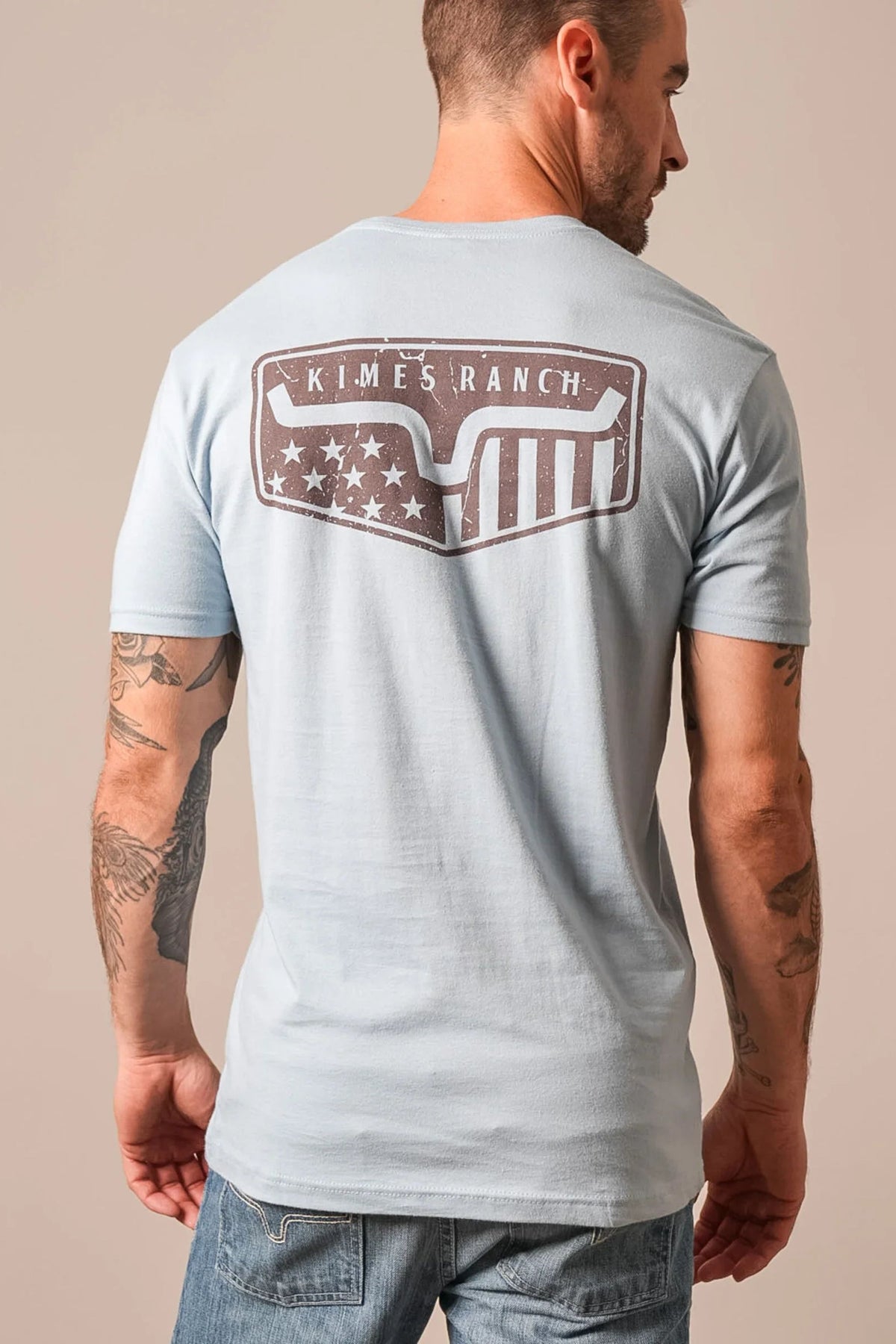 Kimes Ranch Spangled shirt in Stonewashdenim, back view, with a large back graphic featuring the Kimes Ranch logo and stars