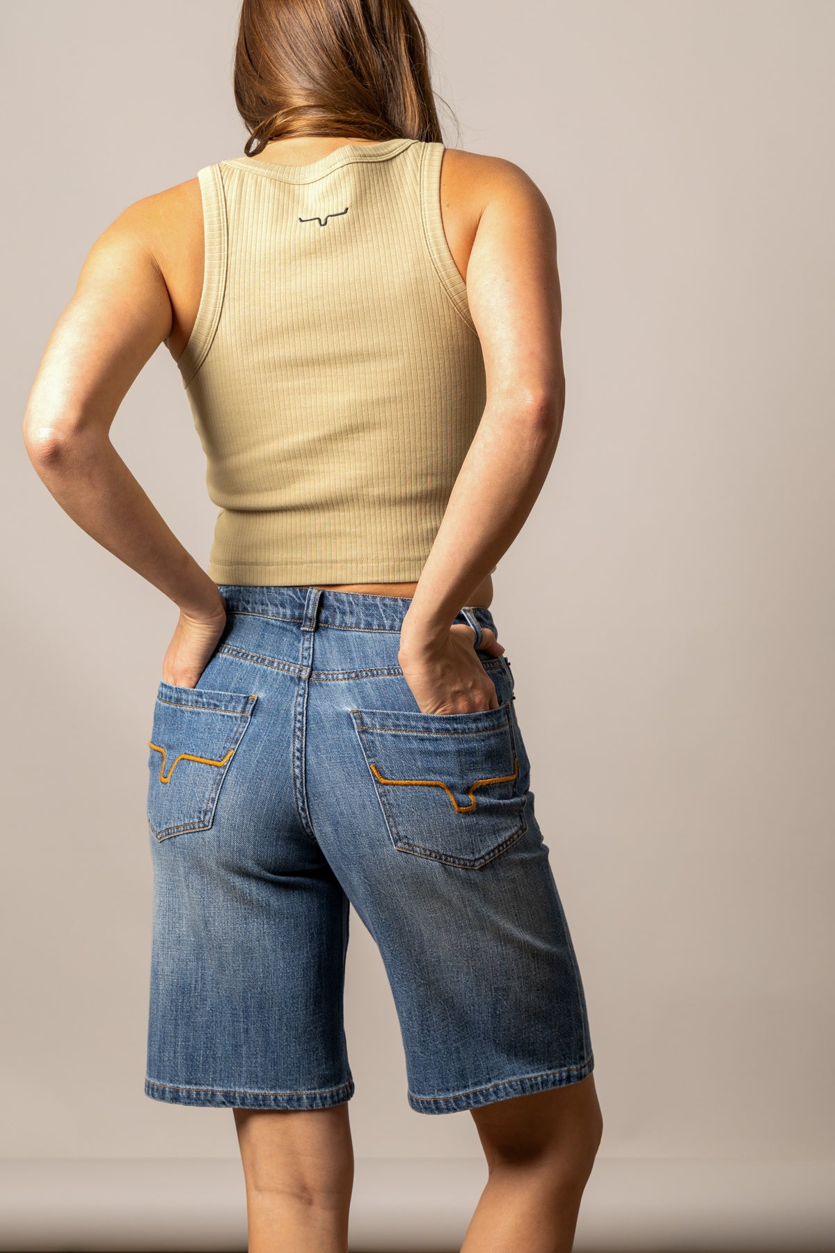 Kimes Ranch Staci jeans in Antique Wash, back view, with back pockets and contrast stitching