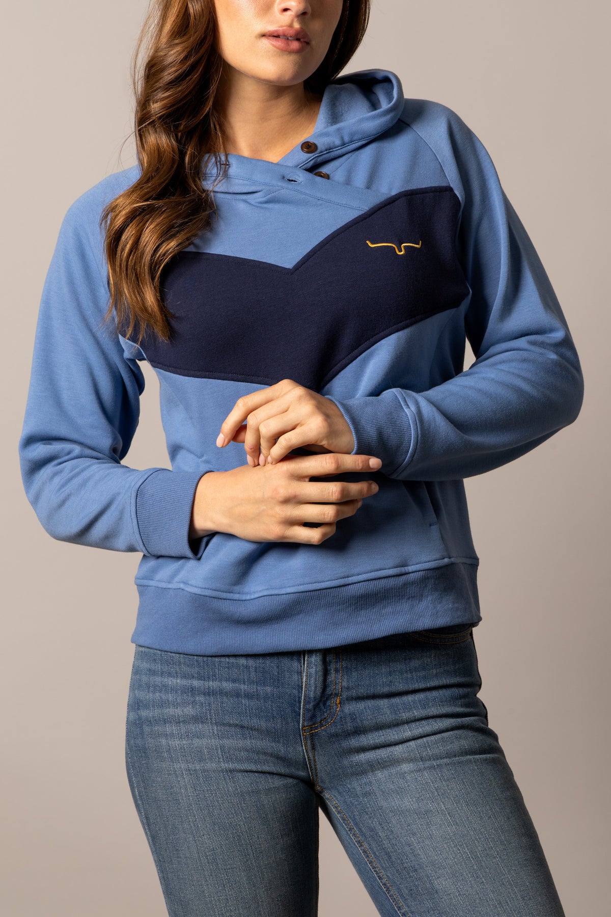 Kimes Ranch Stella hoodie in Mid Blue with navy chevron panel and embroidered Kimes Ranch logo