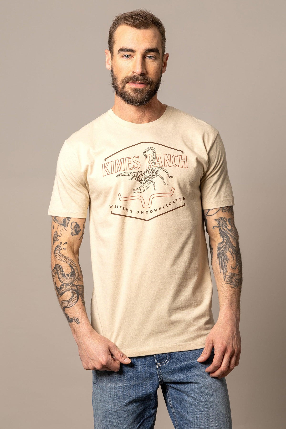 Kimes Ranch Sting shirt in Cream with a scorpion graphic and Western Uncomplicated text