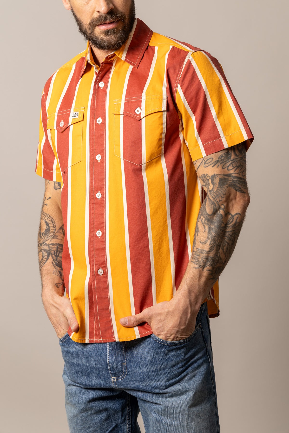 Kimes Ranch Stoppy dress shirt in Brick Red with vertical yellow and white stripes and two chest pockets