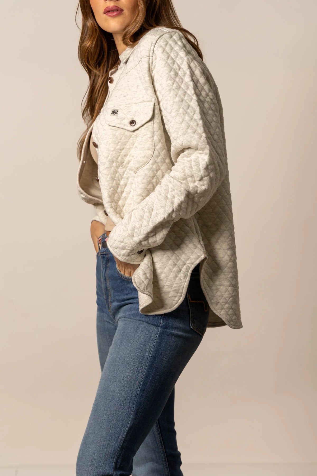 Kimes Ranch Susie Shacket in Natural, side view, with a diamond quilted pattern and front button closure