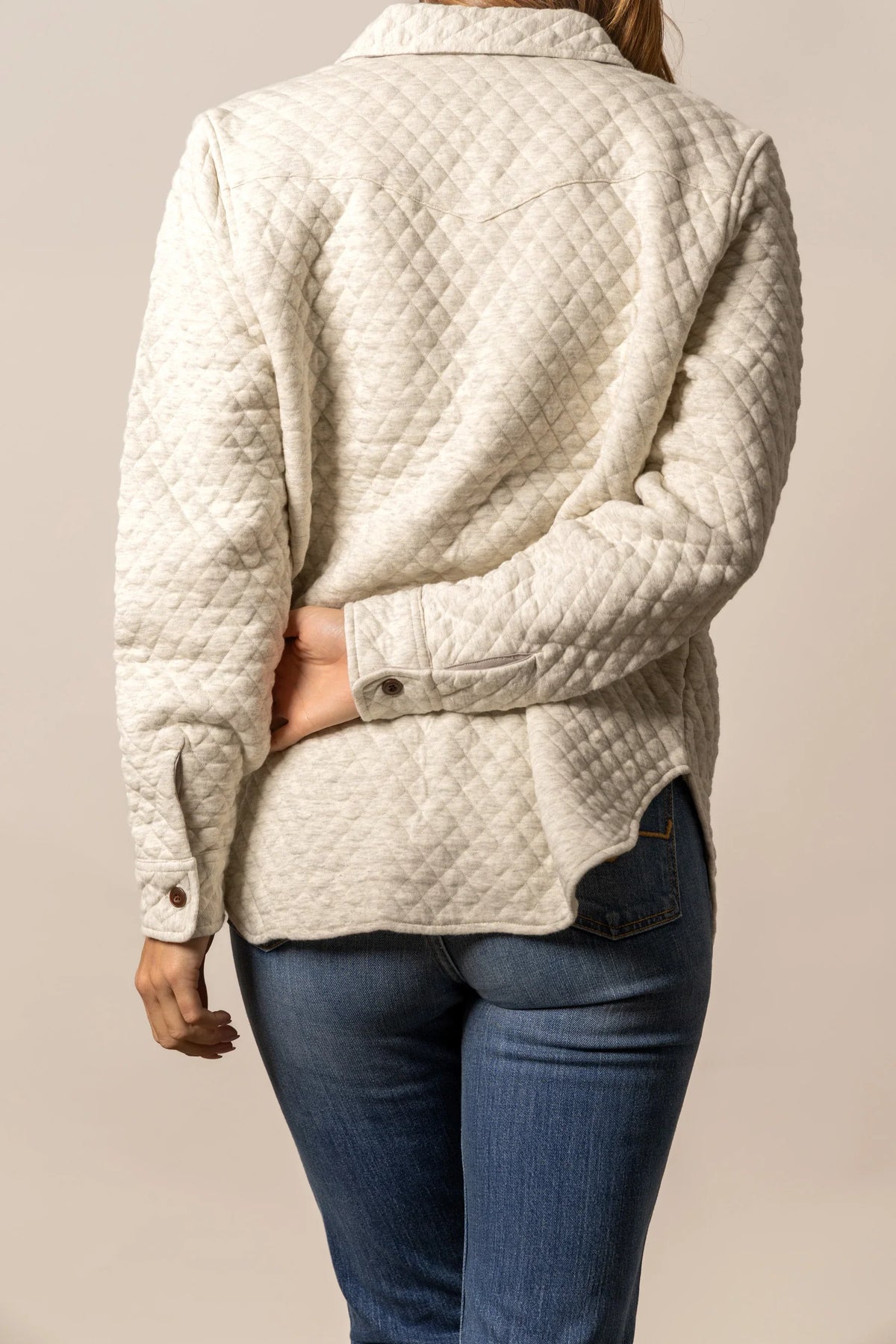 Kimes Ranch Susie Shacket in Natural, back view, with diamond quilting and buttoned cuffs