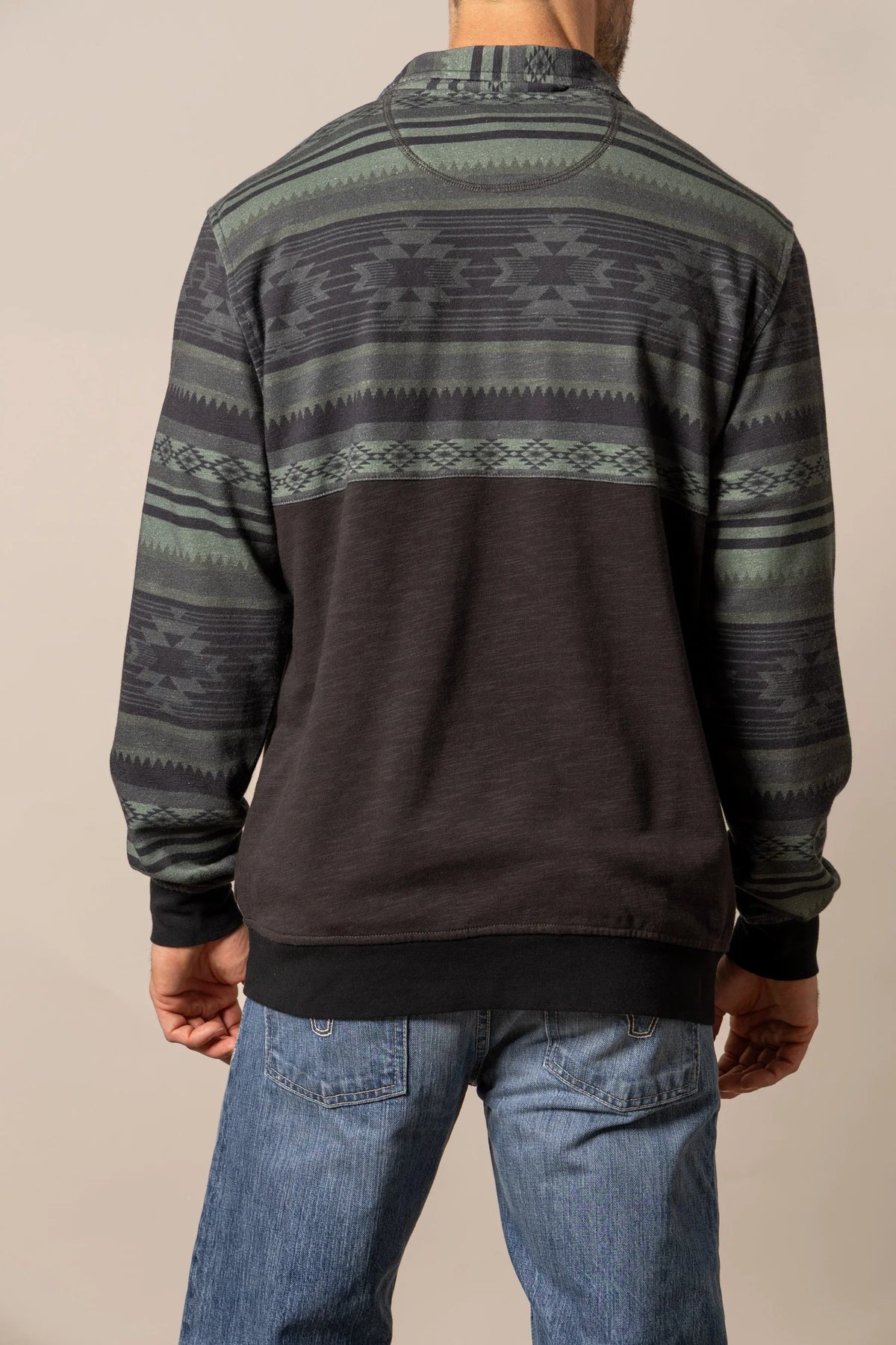Kimes Ranch Tack Pullover sweatshirt in Black, back view, with green and grey geometric pattern on the back yoke and sleeves