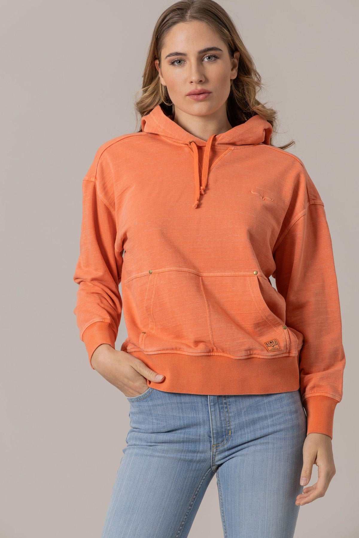 Kimes Ranch Tess Western Hoodie in Orange with a kangaroo pocket and embroidered logo