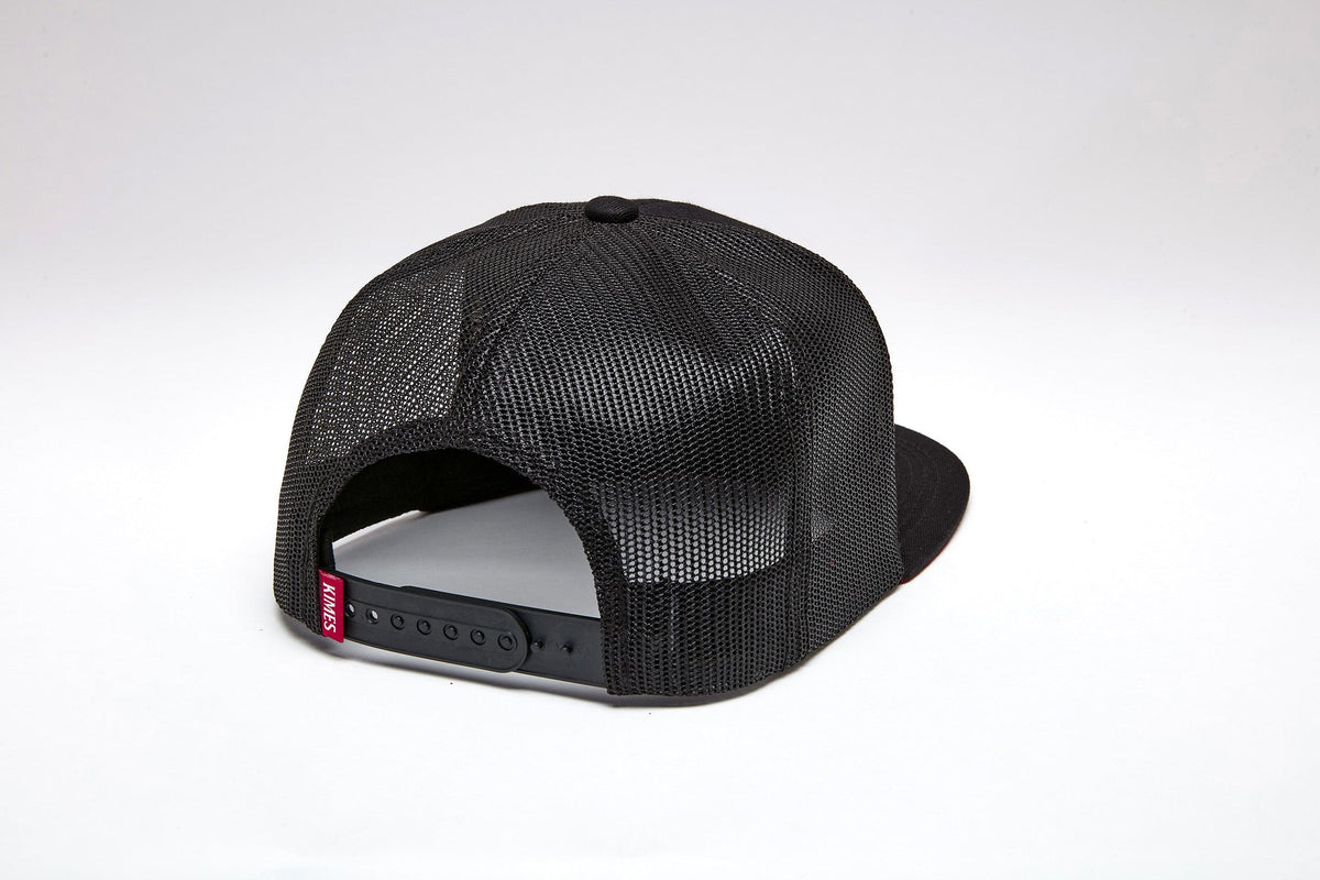 Kimes Ranch Texola, back view, Black mesh trucker hat with adjustable snapback closure and red Kimes Ranch logo tab