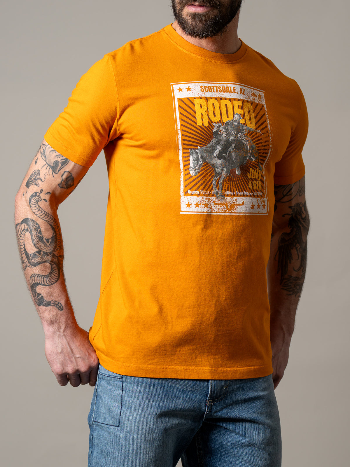 Kimes Ranch Top Bill shirt in Vintage Orange with a Scottsdale Rodeo graphic print