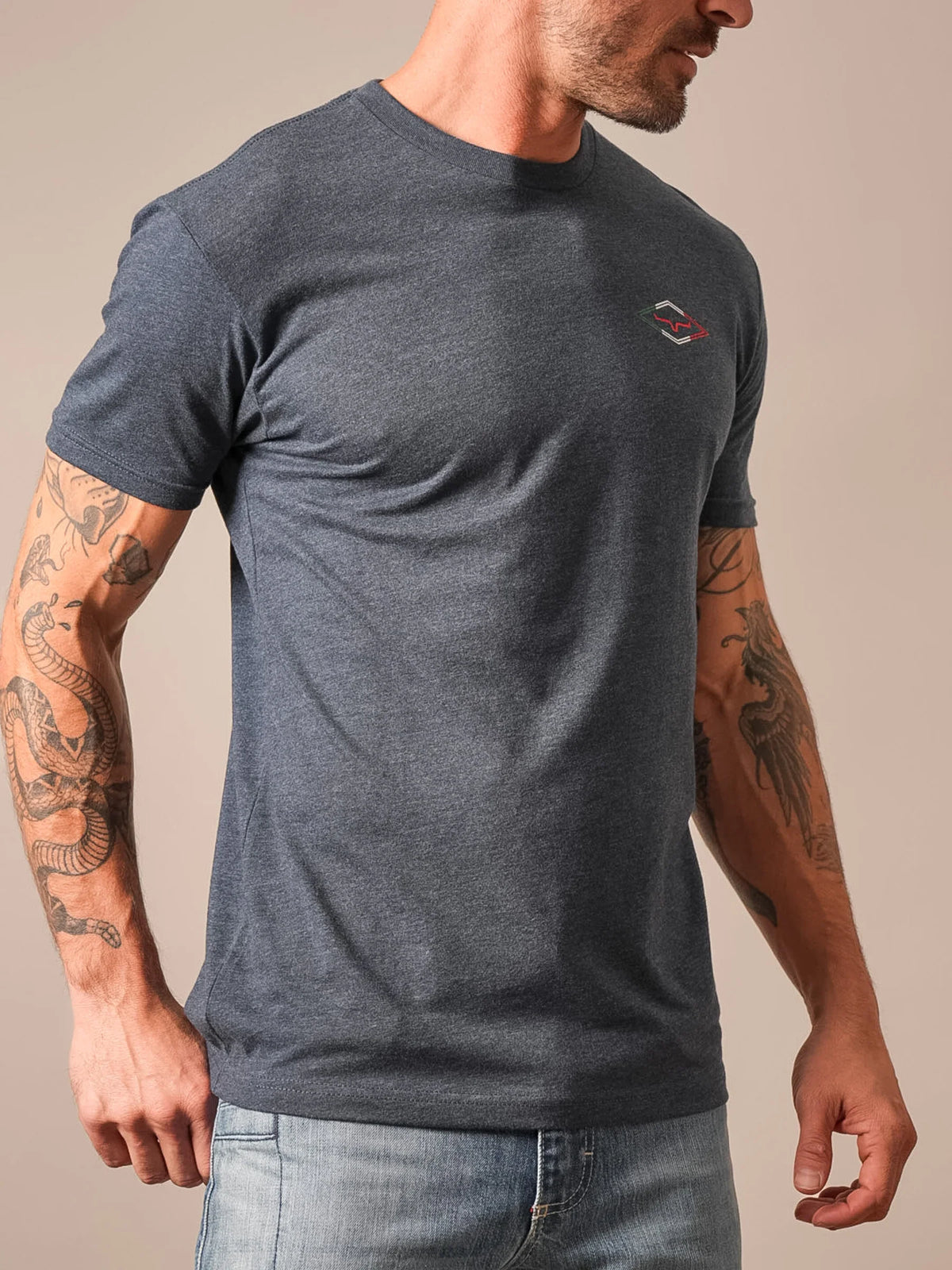 Kimes Ranch Tredwell shirt in Midnight Navy, side view, with short sleeves and a crew neck with a small logo on the chest