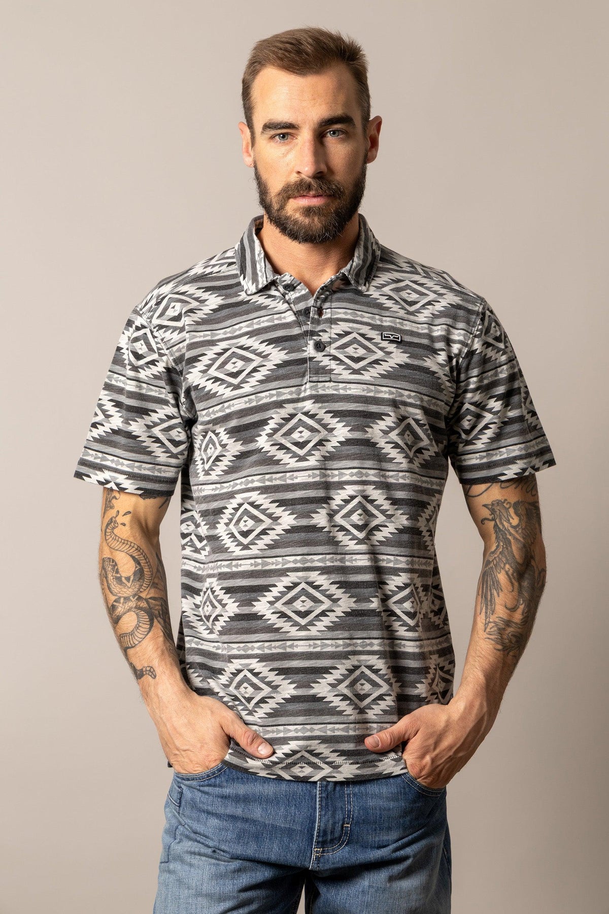 Kimes Ranch Tulum Polo in Grey with a geometric diamond pattern and short sleeves