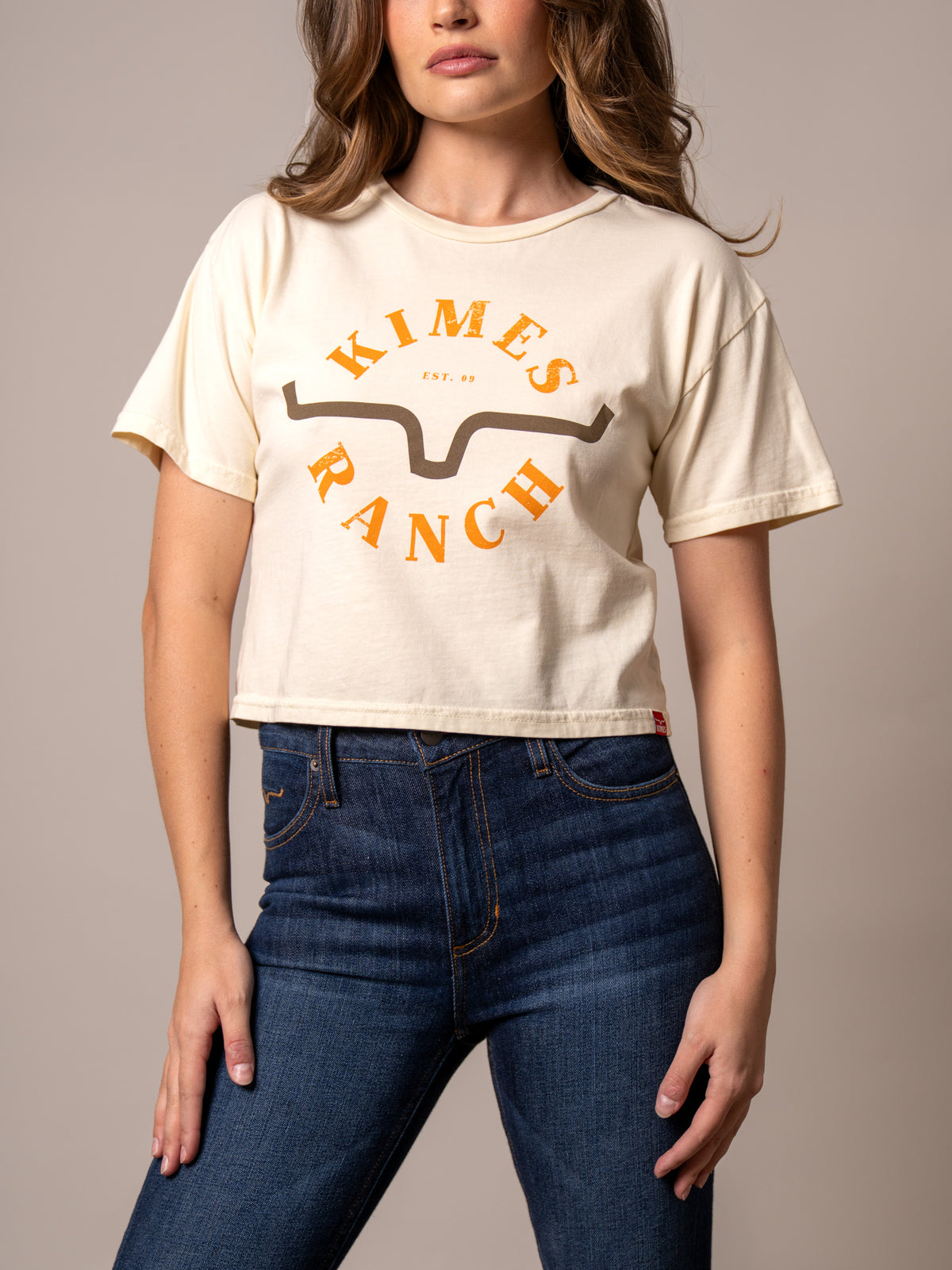 Kimes Ranch Uncomplicated shirt in Ivory with a front graphic featuring the Kimes Ranch logo and EST. 09 text