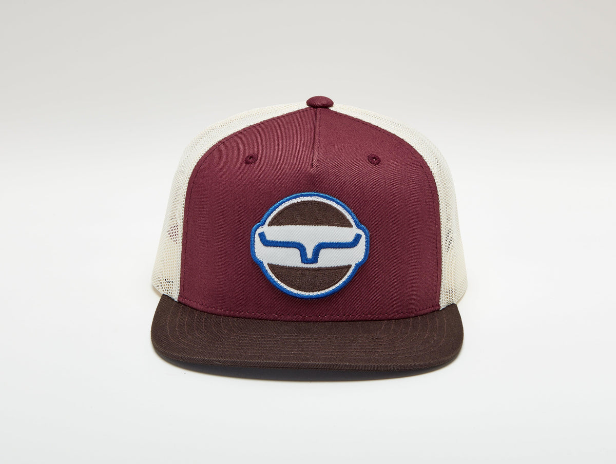Kimes Ranch Union Made Trucker Hat in Rust with a circular embroidered logo on the front