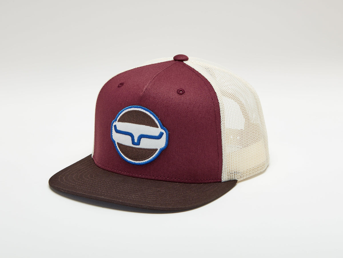 Kimes Ranch Union Made Trucker Hat in Rust, side view, with a brown brim and cream mesh back featuring the Kimes Ranch logo