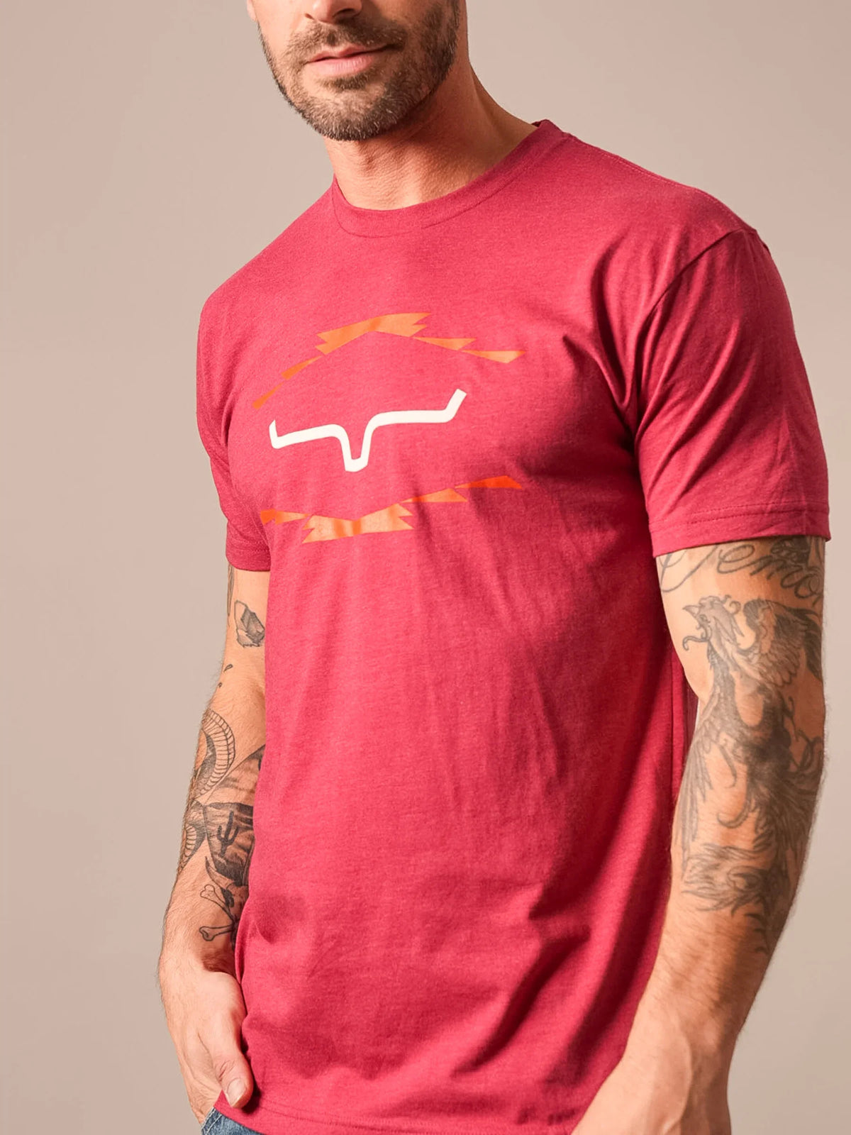 Kimes Ranch Vintage Badge shirt in Cardinal with a white steer logo and orange lightning bolts