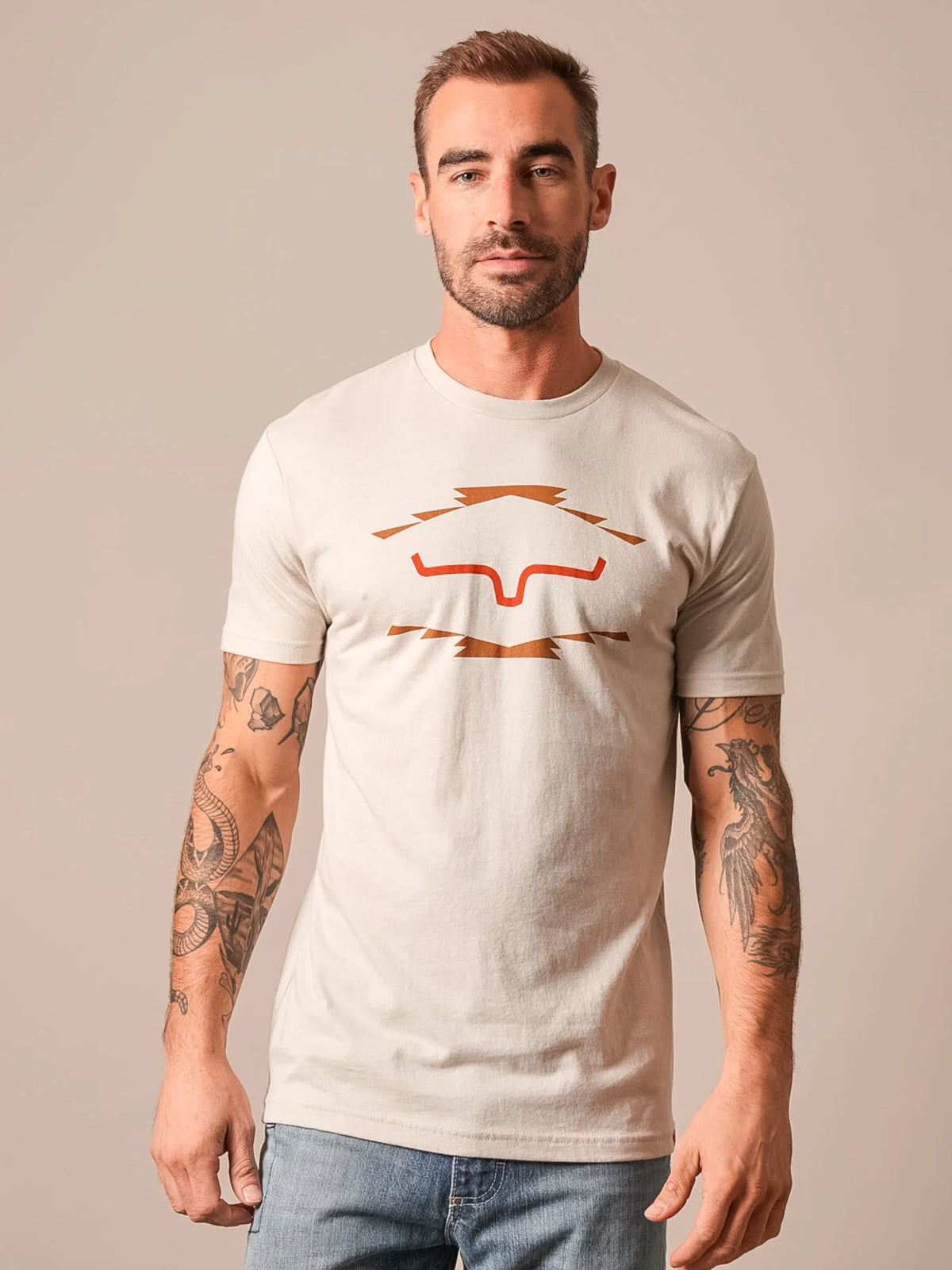 Kimes Ranch Vintage Badge shirt in Sand with a stylized Kimes Ranch logo on the chest