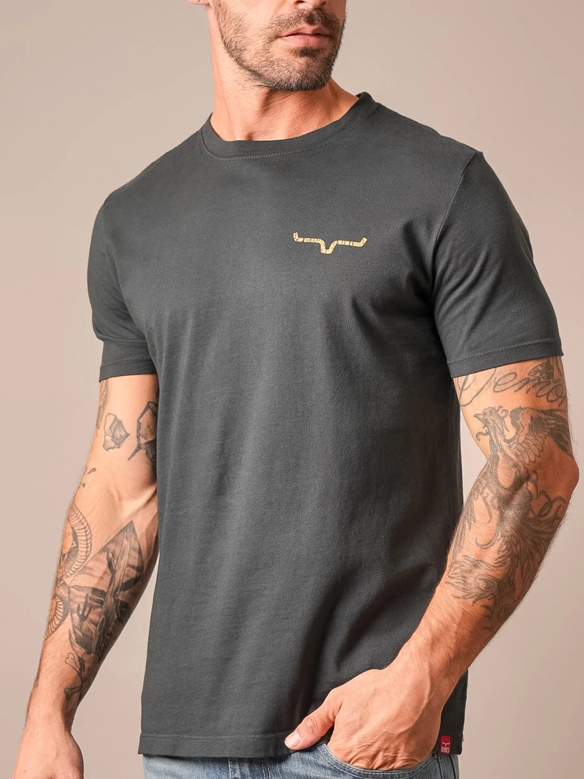 Kimes Ranch Waspy RP shirt in Black with a small gold logo on the chest