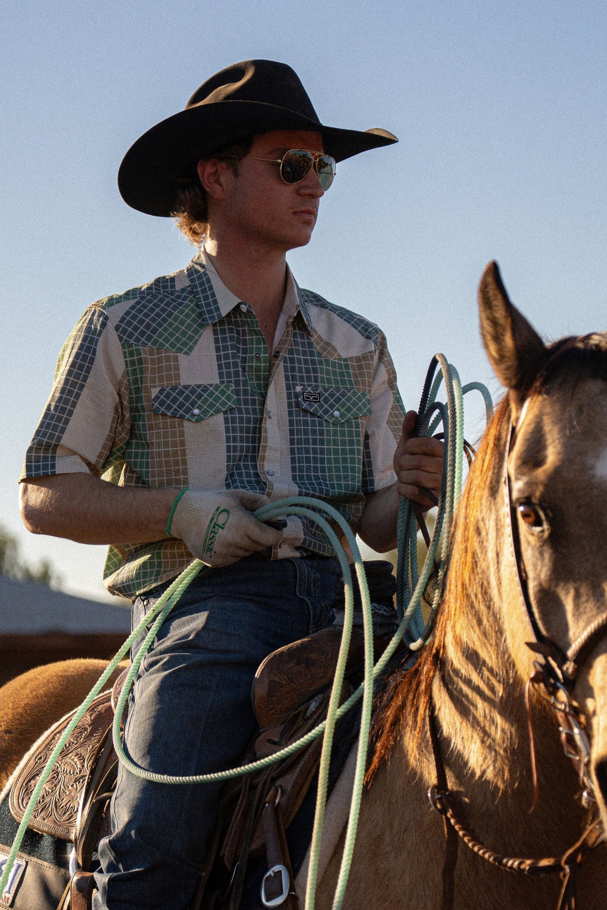 Kimes Ranch Chico dress shirt in Green with a plaid pattern and two chest pockets