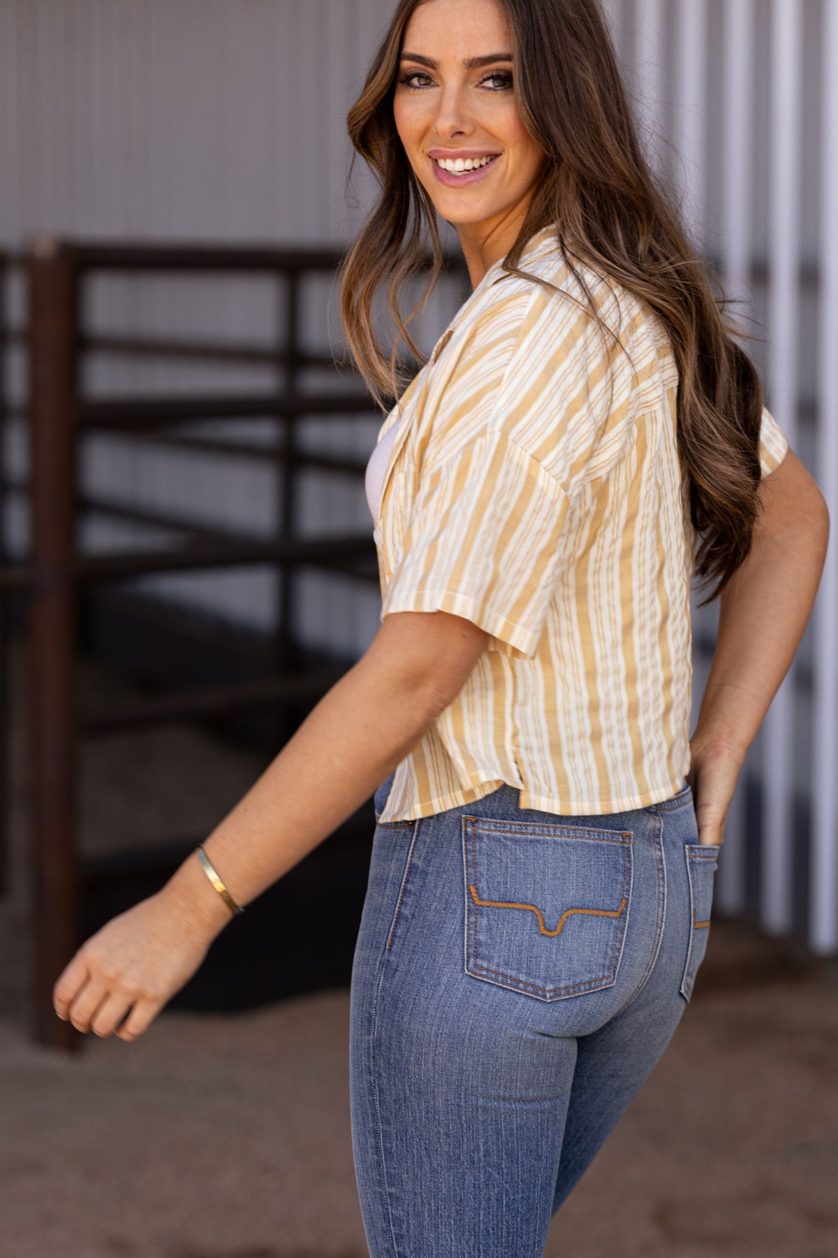 Kimes Ranch Ferris Top in Yellow Ocre, side view, with short sleeves and a striped pattern