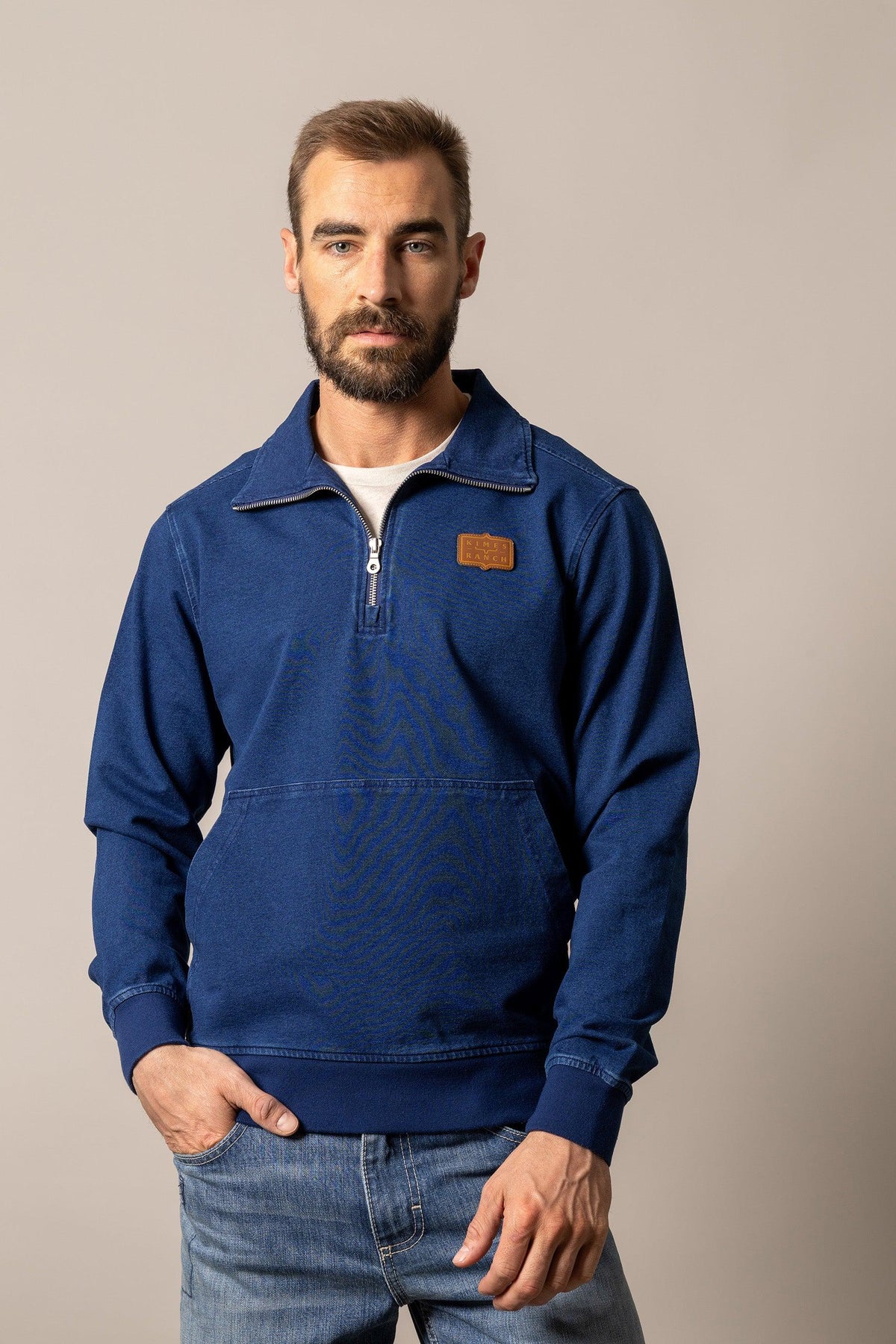 Kimes Ranch Wicklow Indigo sweatshirt with a quarter-zip collar and front kangaroo pocket