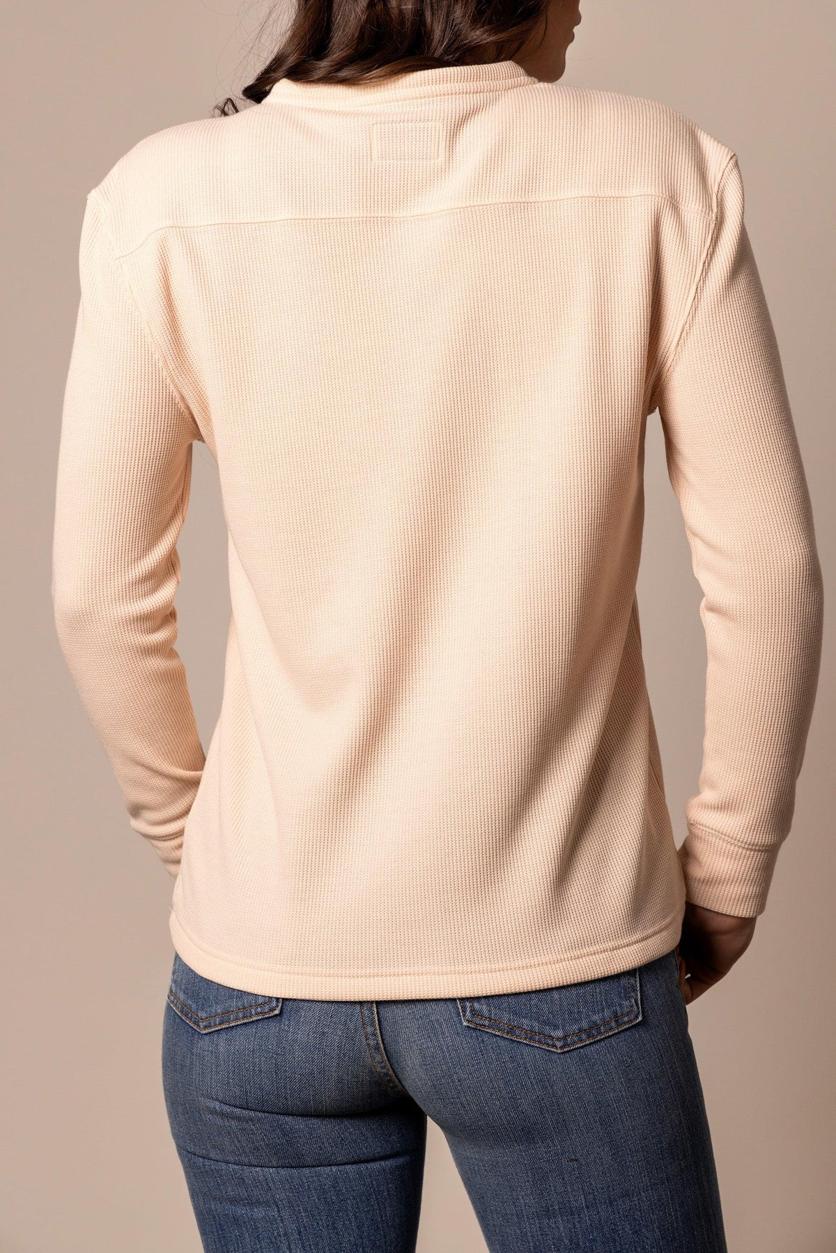 Kimes Ranch Wilma long sleeve thermal top in Peach, back view, with a back yoke and ribbed cuffs