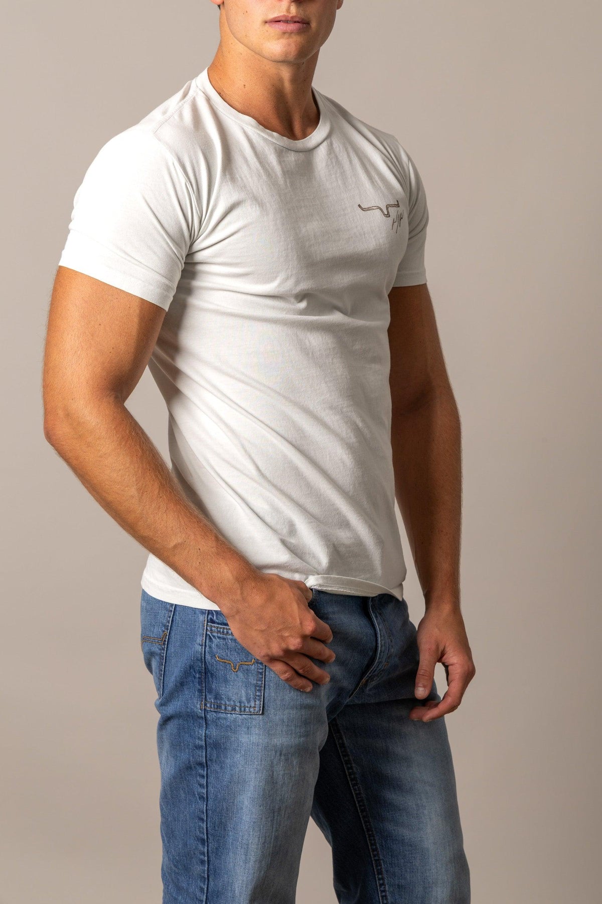 Kimes Ranch Winning Ride RP shirt in Off White, side view, with short sleeves and the Kimes Ranch logo on the chest