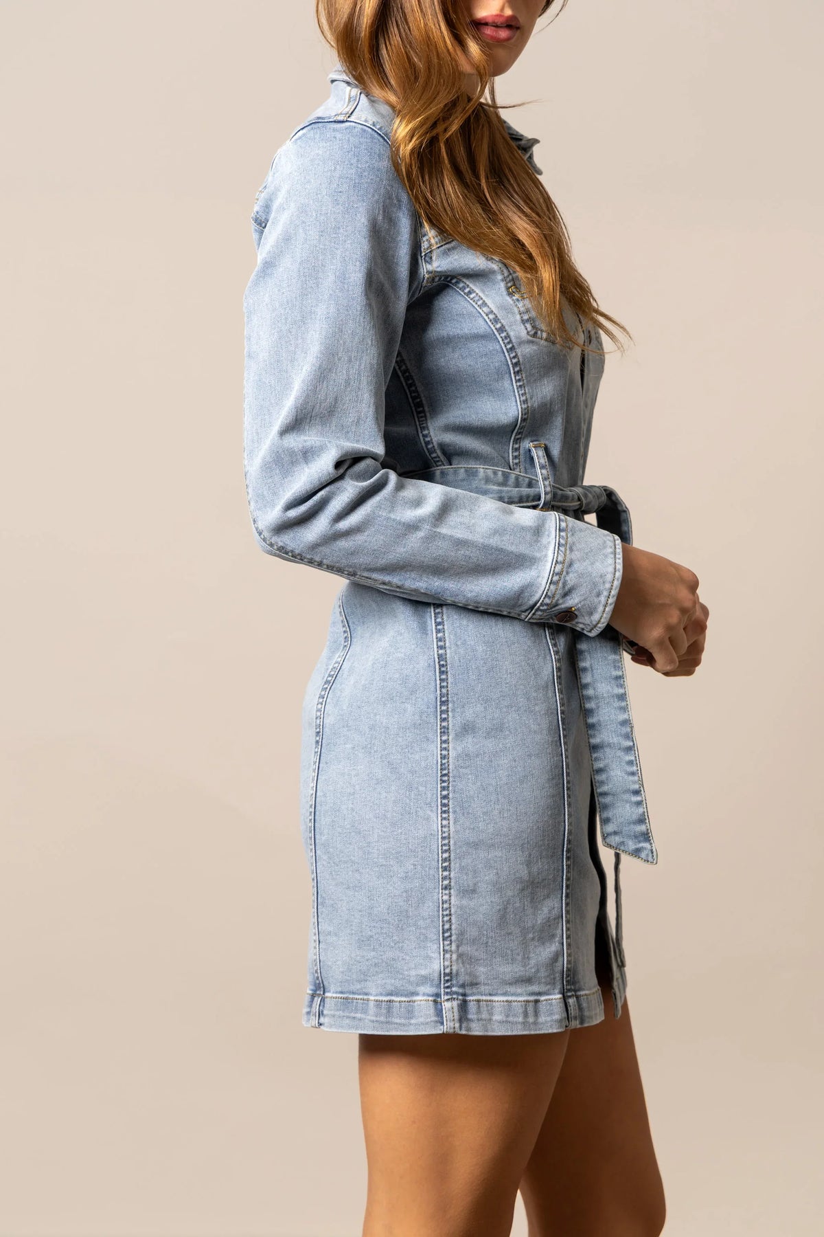 Kimes Ranch Winslow Trucker Dress in Light Wash Indigo, side view, with a belted waist and long sleeves