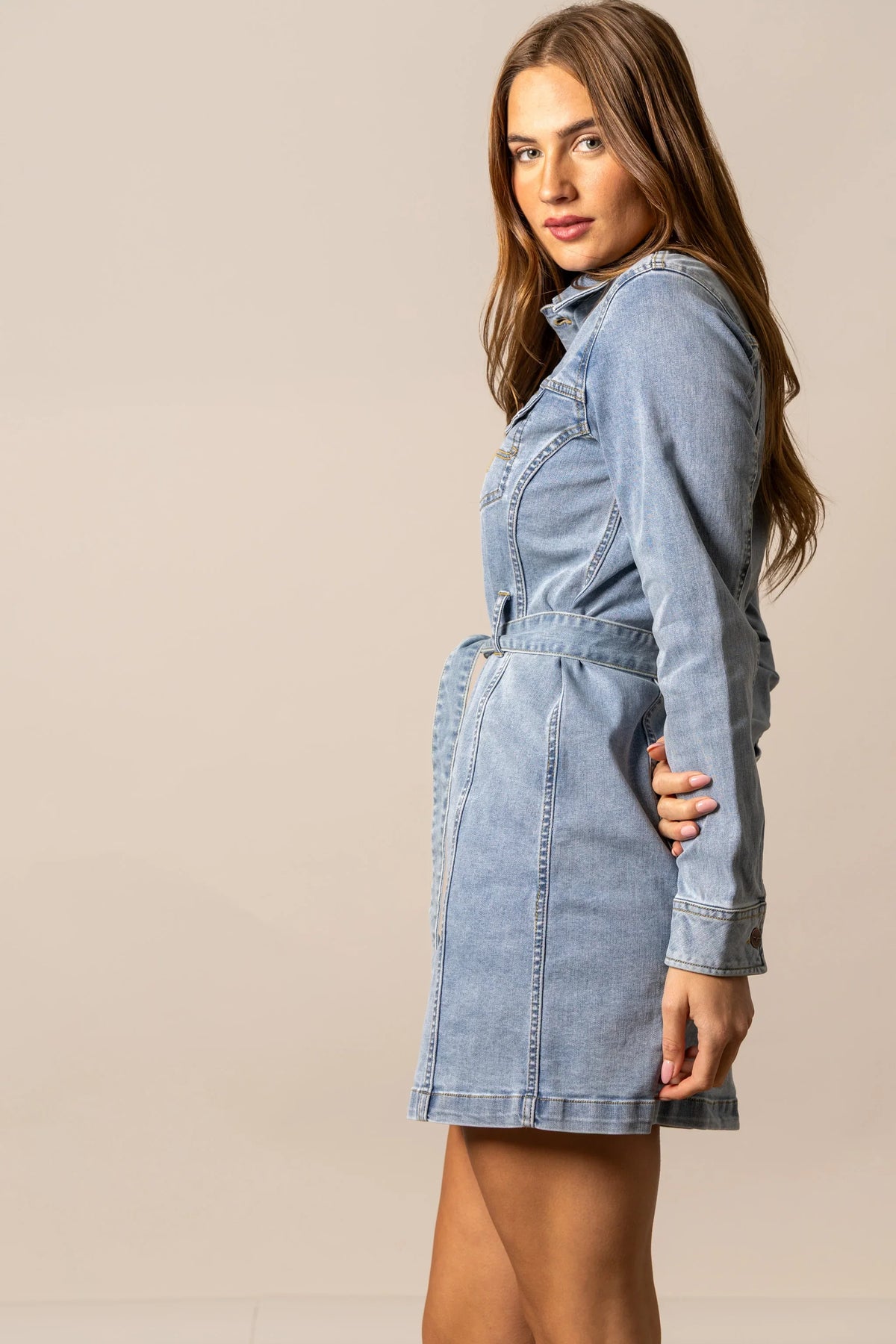 Kimes Ranch Winslow Trucker Dress in Light Wash Indigo, side view, with a belted waist and long sleeves