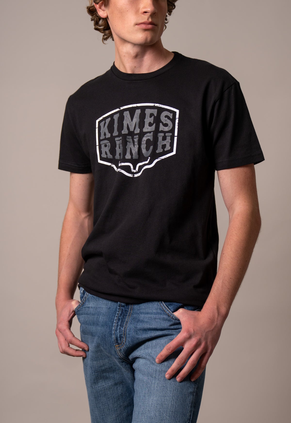 Kimes Ranch Wood Block shirt in Black with a distressed Kimes Ranch logo graphic on the chest