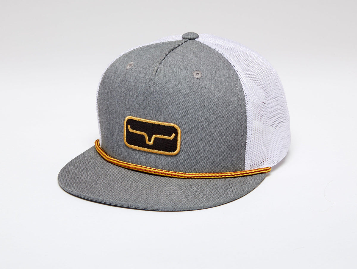 Kimes Ranch Workhard Trucker Hat in Grey Heather, side view, with a black and gold logo patch and gold trim