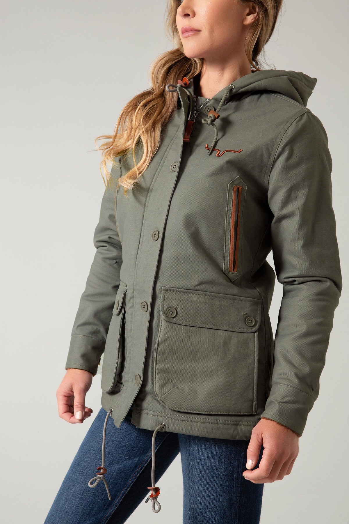 Kimes Ranch AWA Jacket in Dark Army, side view, with front pockets and logo
