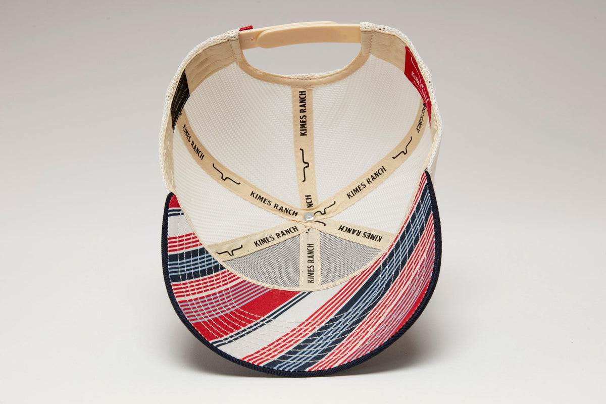 Kimes Ranch Anson Trucker Hat, back view, with red, white, and blue plaid brim and branded interior sweatband