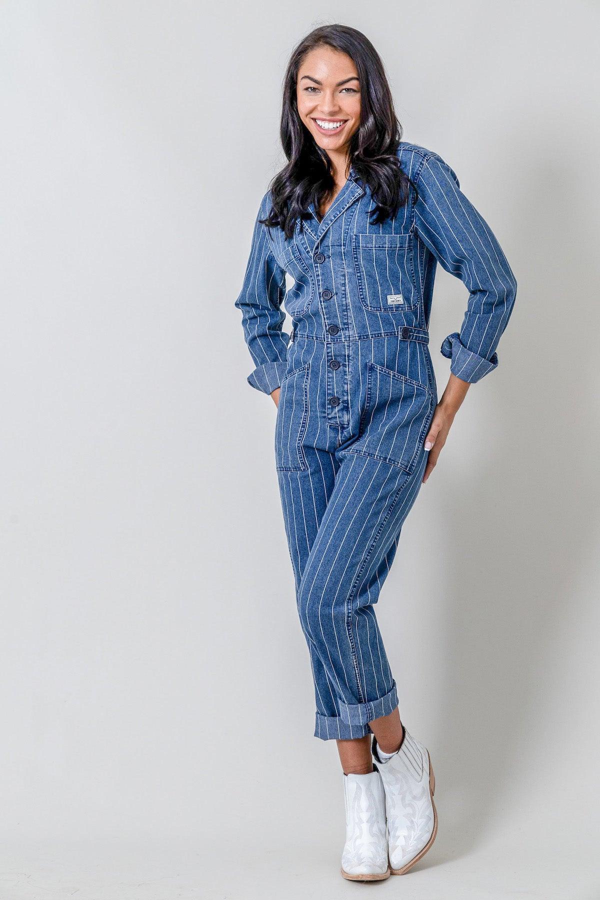 Kimes Ranch Chimayo Jumpsuit in Indigo with long sleeves, front pockets, and a button-down front