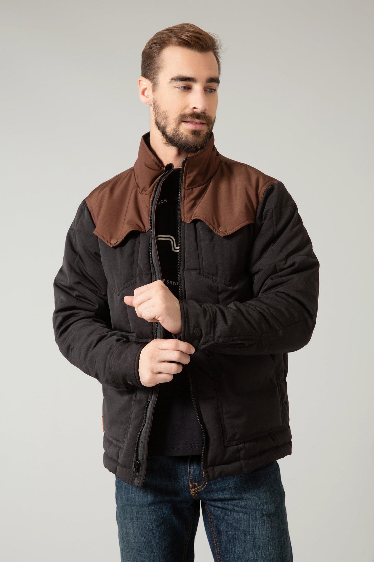 Kimes Ranch Colt Jacket in Black Brown with a brown yoke and collar over a black quilted body