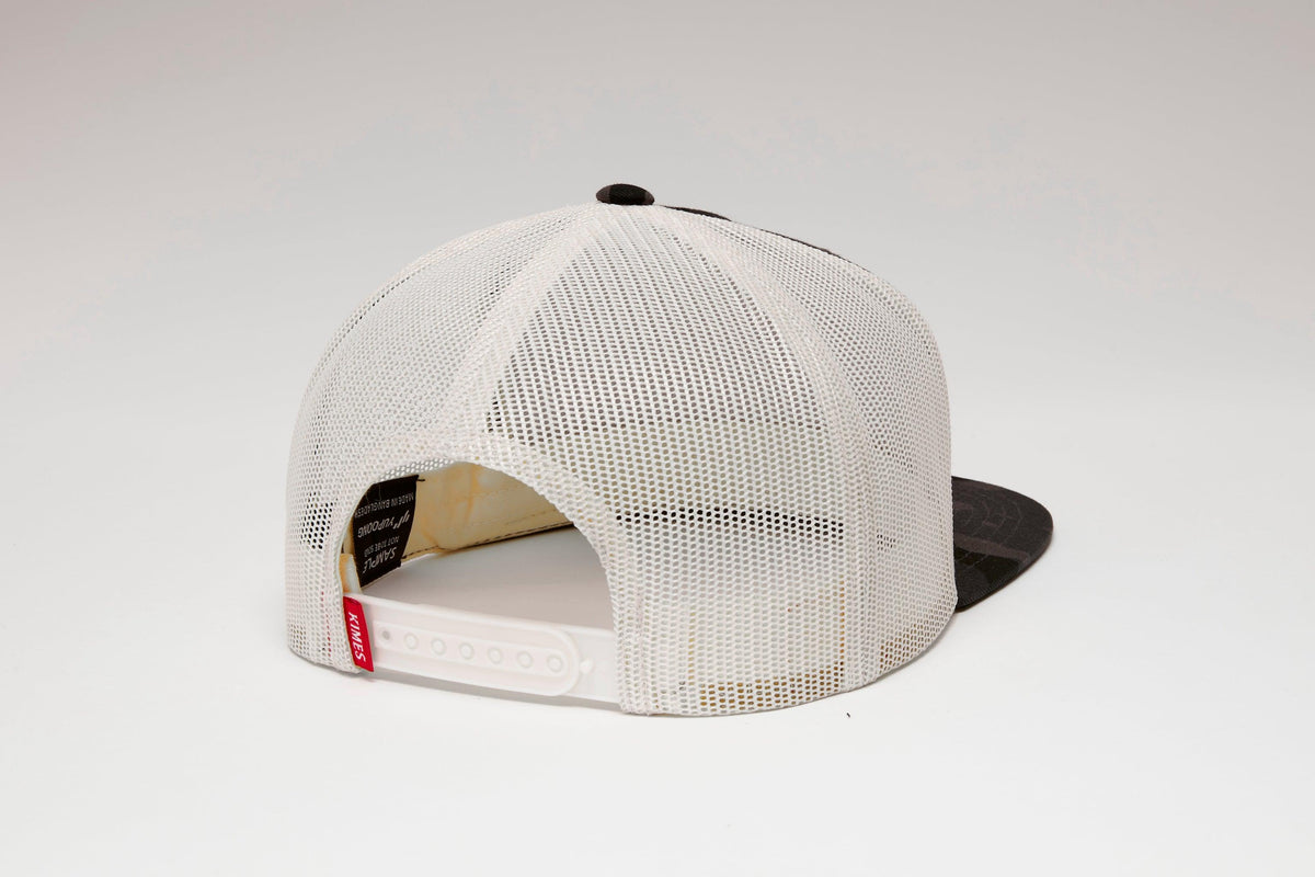 Kimes Ranch Diamond Dogs Trucker Hat in Night Camo, back view, with white mesh back and adjustable strap