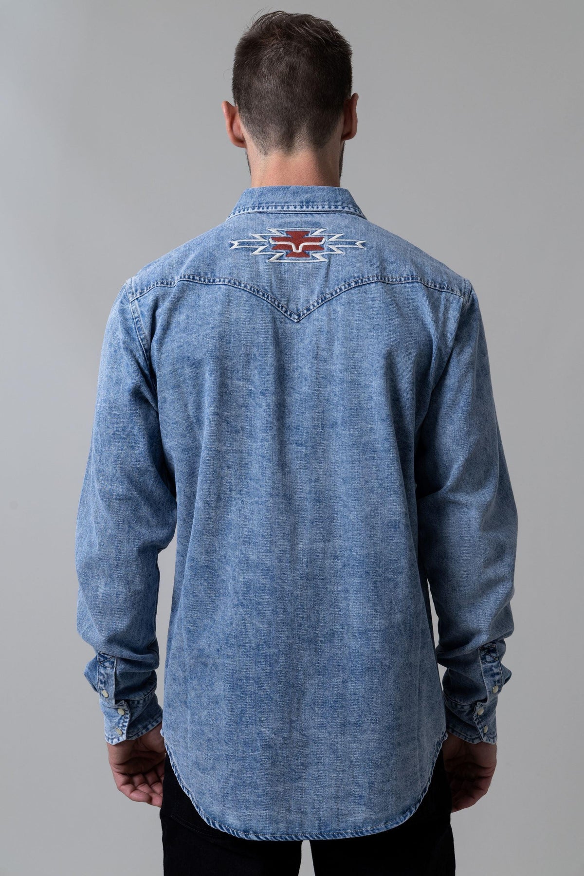 Kimes Ranch Durango Denim dress shirt in Indigo Blue, back view, with a back yoke and embroidered Kimes Ranch logo