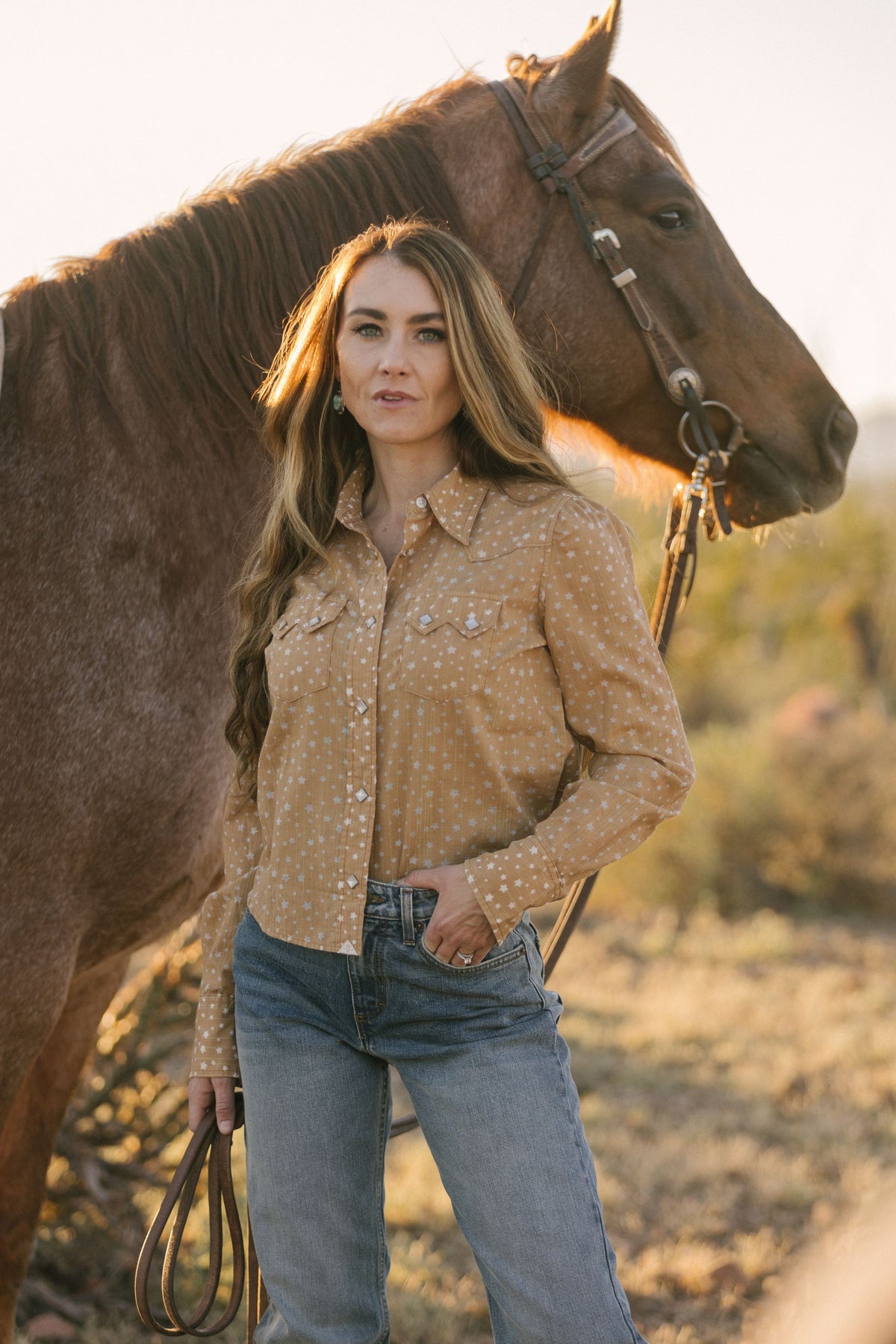 Kimes Ranch Etoile long sleeve top in Tobacco with white star print and snap pockets