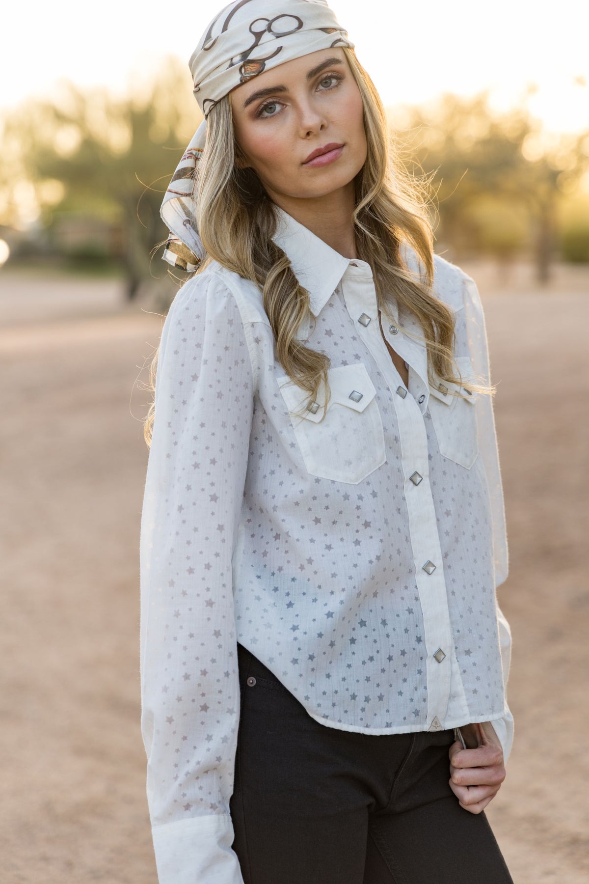 Kimes Ranch Etoile top in Pristine with a star print and silver-tone snap buttons