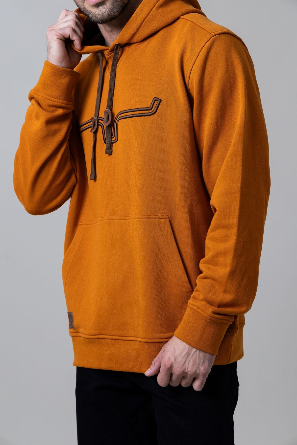 Kimes Ranch Fast Talker Hoodie in Burnt Orange with embroidered steer logo and kangaroo pocket