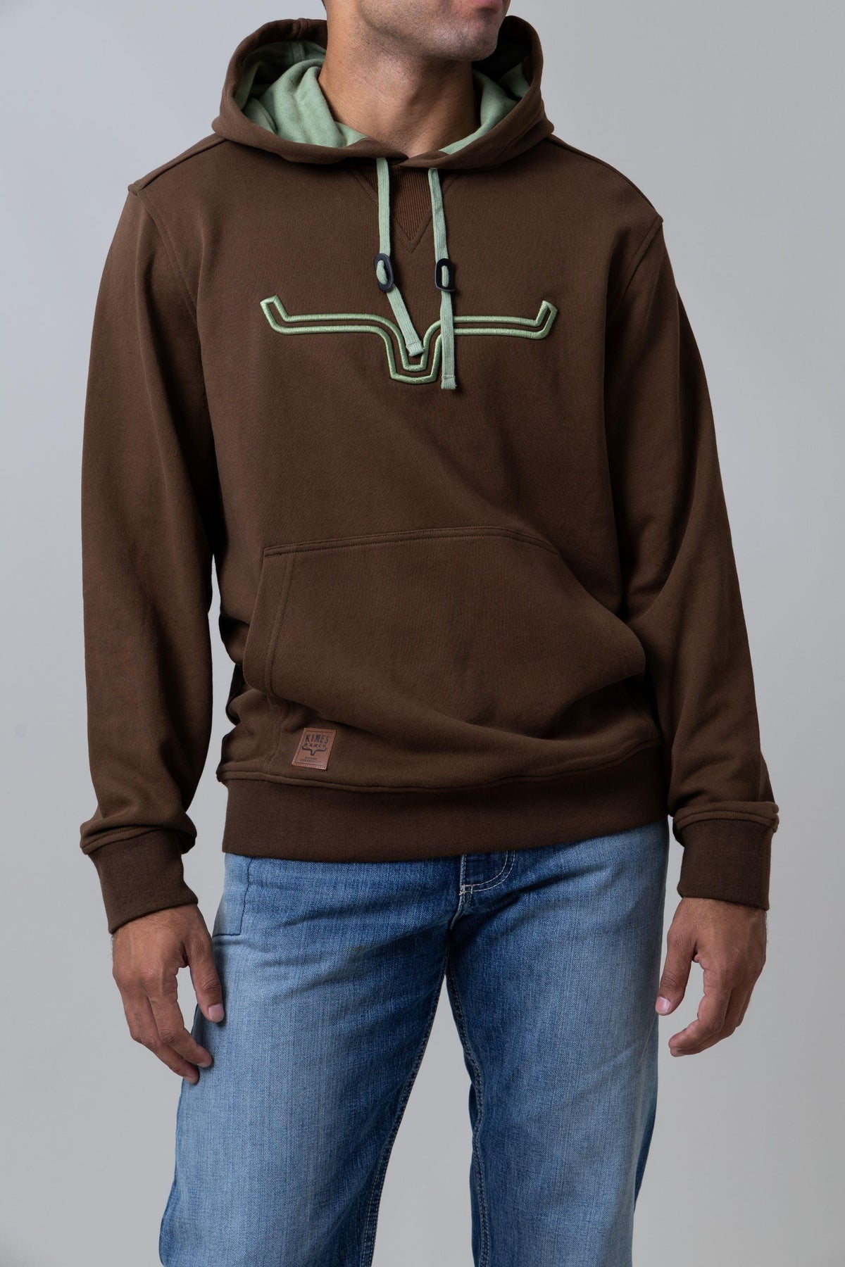 Kimes Ranch Fast Talker Hoodie in Dark Brown with sage green contrast drawstrings and embroidered logo