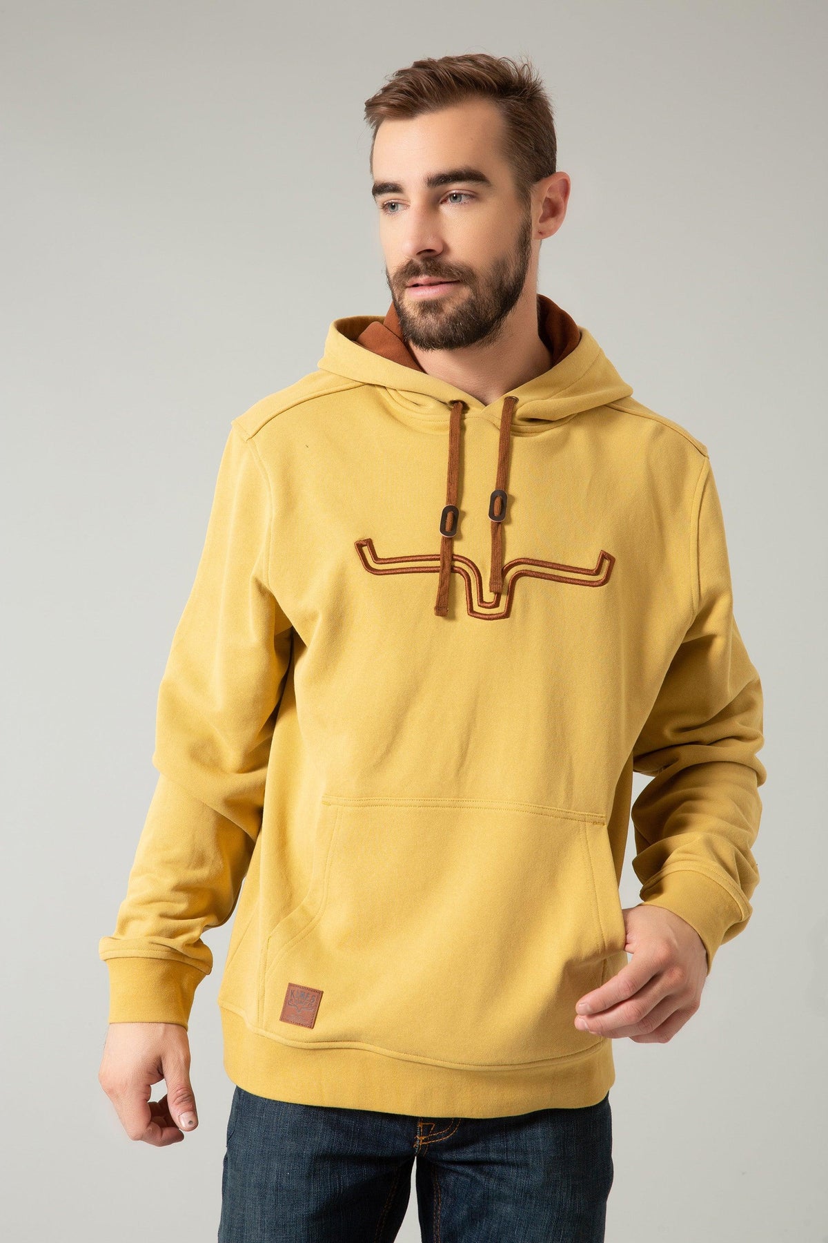 Kimes Ranch Fast Talker Hoodie in Mustard with embroidered longhorn graphic and front kangaroo pocket