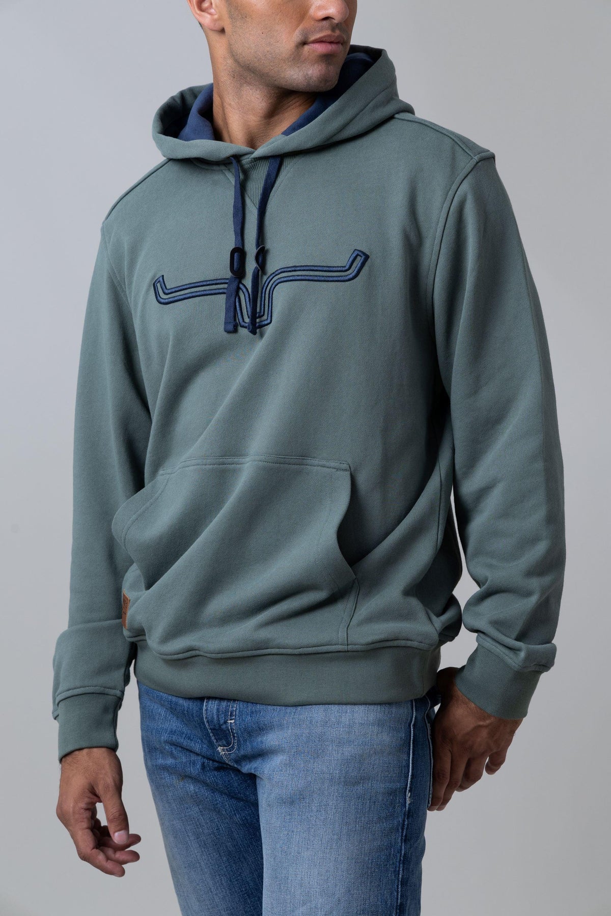 Kimes Ranch Fast Talker Hoodie in Pine with embroidered logo and kangaroo pocket
