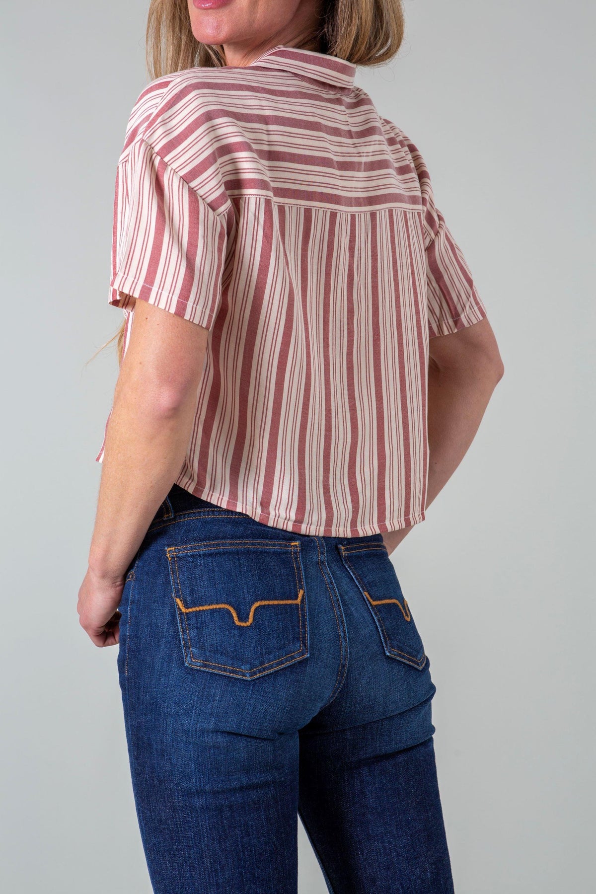 Kimes Ranch Ferris Top in Earth Red, back view, with short sleeves and a striped yoke
