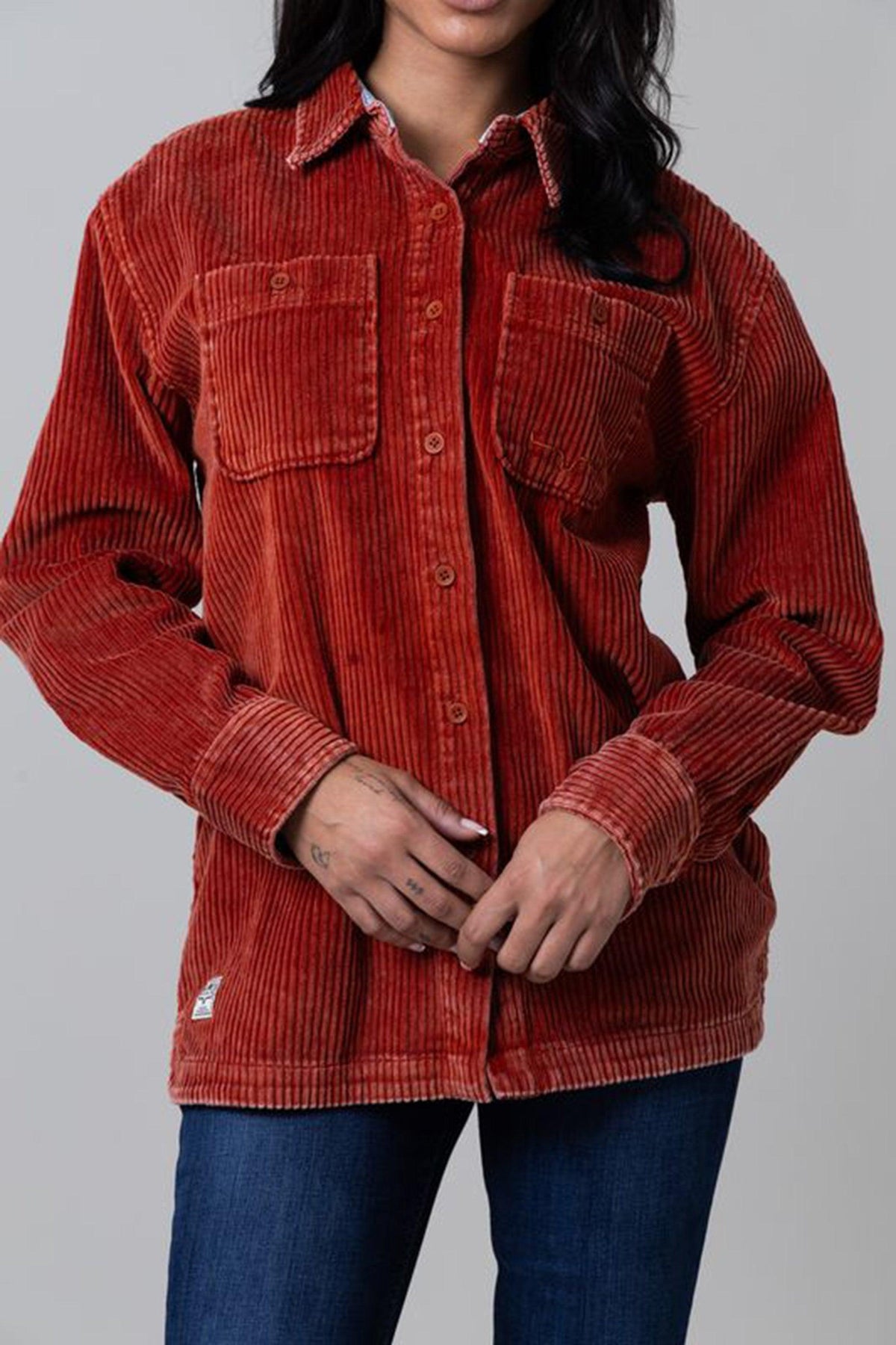 Kimes Ranch Luna Cord long sleeve button front shirt in Rust Red with two chest pockets and a collar