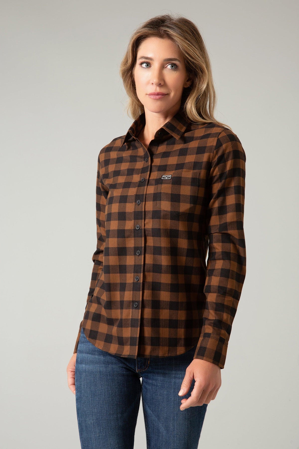 Kimes Ranch Ladies Garrison top in Brown with a black check pattern and a chest pocket