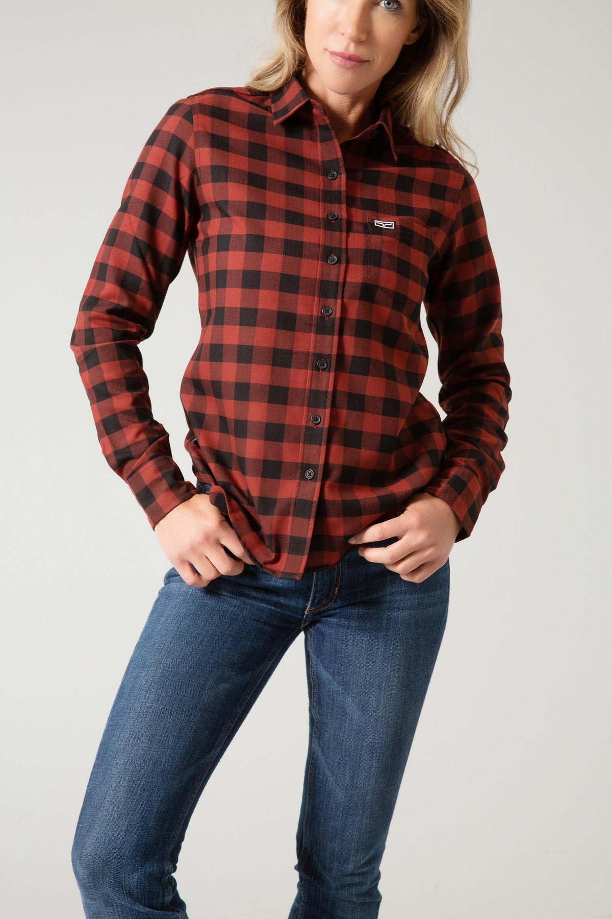 Kimes Ranch Ladies Garrison long sleeve button-up top in red and black buffalo plaid with chest pocket and logo